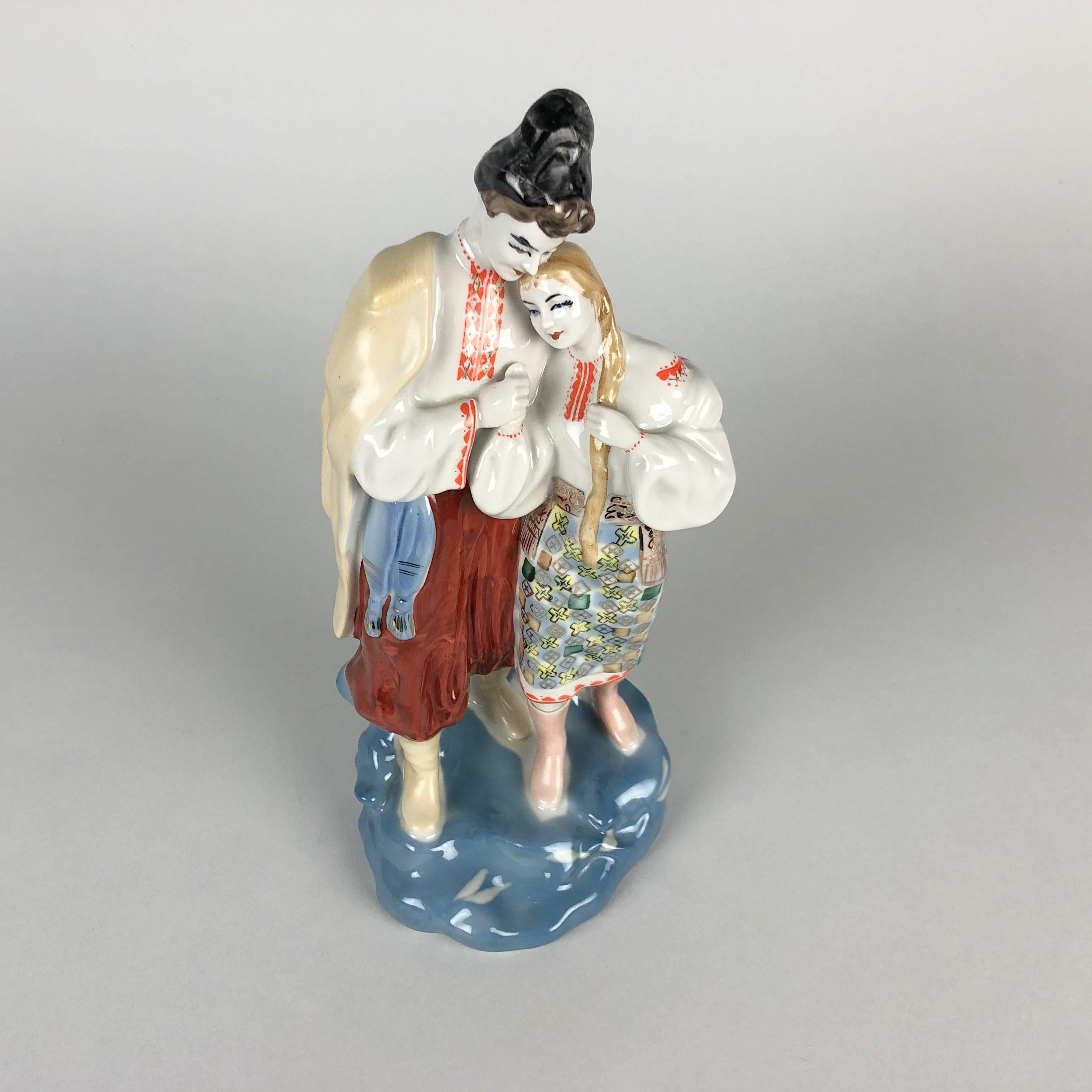 Vintage Ukrainian porcelain figurine of two lovers in a very good vintage condition. Marked with 