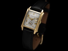 1950’s Ulysse Nardin 14K Gold Mens Midsize Watch with Sculpted Case – Box & Tag