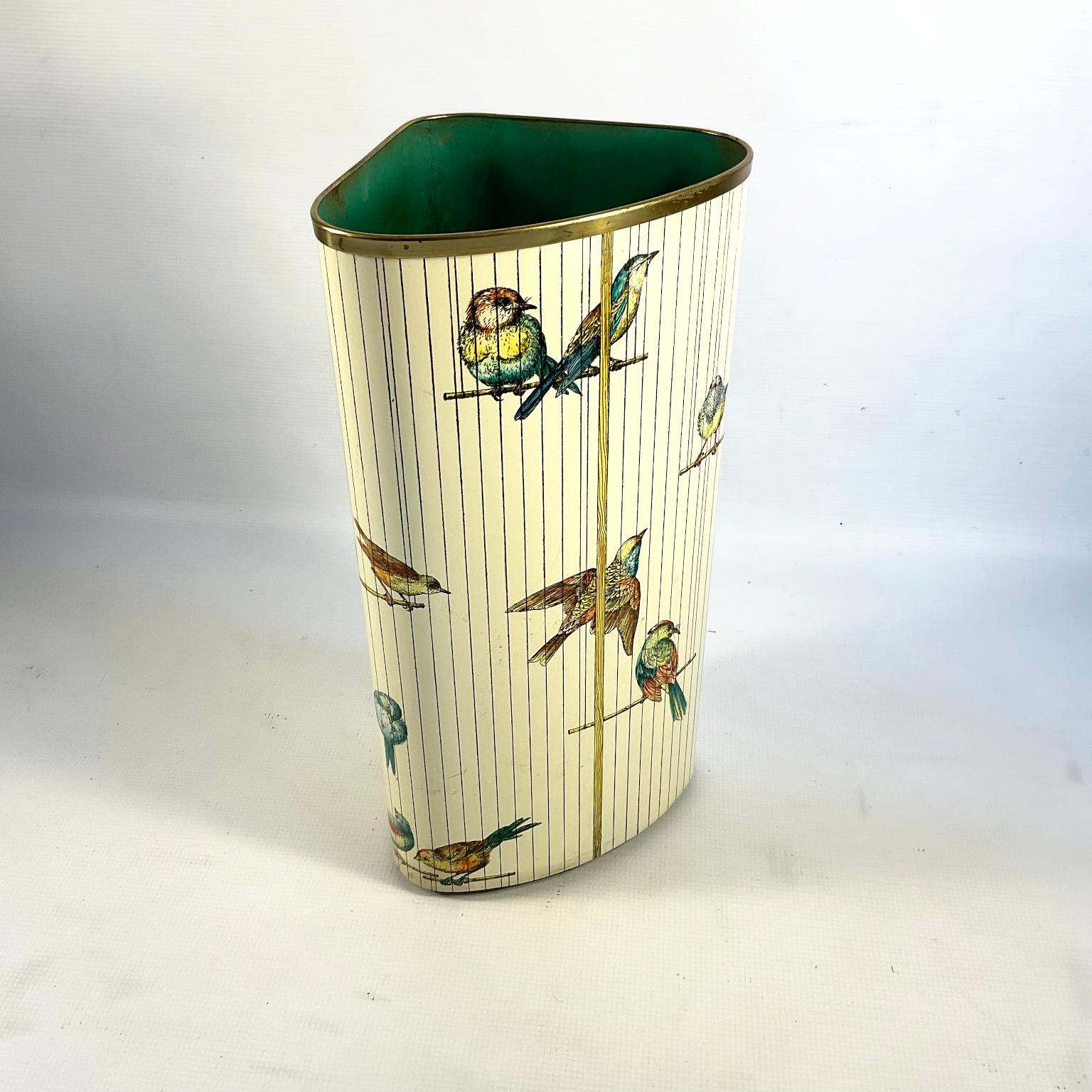 1950s corner umbrella stand by Felice Galbiati. Enamel painting on metal decorated by hand with colorful birds. In a style reminiscent of Piero Fornasetti with a brass trim finish and lime green paint on the inside.
Stamped underneath 