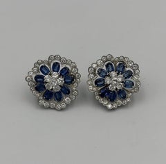 1950s Van Cleef & Arpels Platinum, Diamond and Sapphire Camelia Earrings