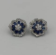 1950s Van Cleef & Arpels Platinum, Diamond and Sapphire Camelia Earrings