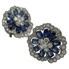 1950s Van Cleef & Arpels Platinum, Diamond and Sapphire Camelia Earrings