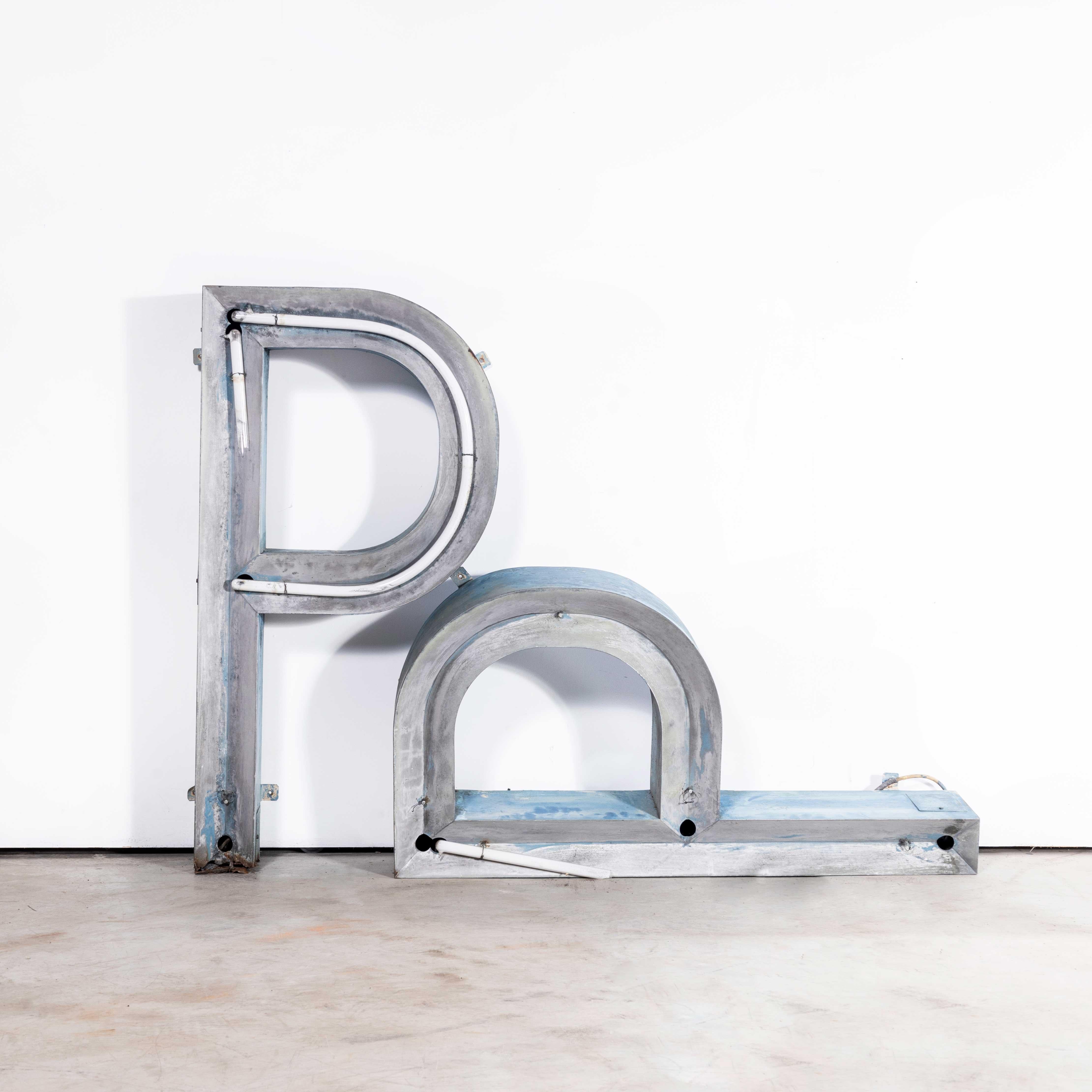 1950’s Very Large Original Sign Letter P – One Meter High.
1950’s Very Large Original Sign Letter P – One Meter High. Made from galvanised sheet metal with the original faded paint. We have kept as much of the original neon glass tubing but please