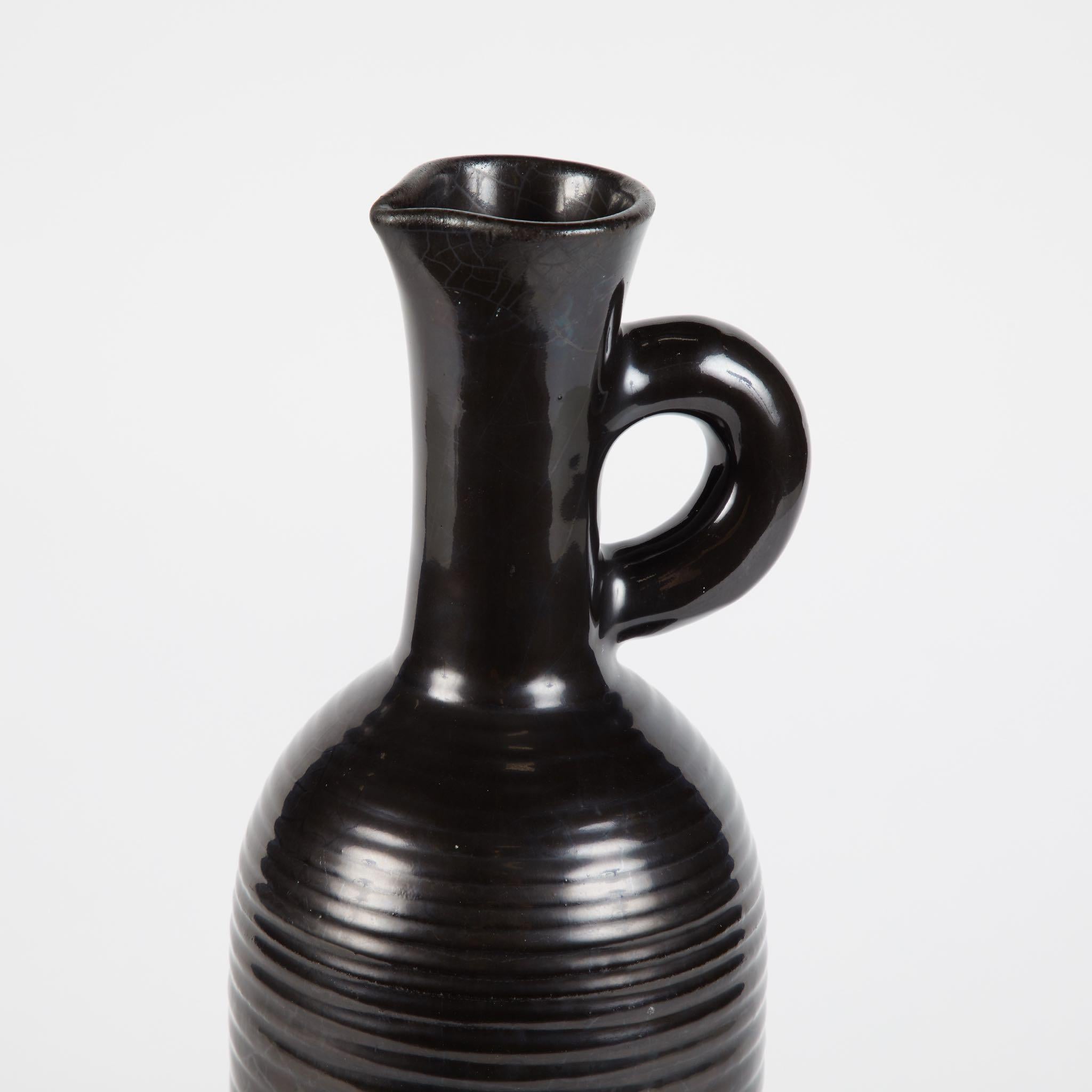 1950s black vessel from England.