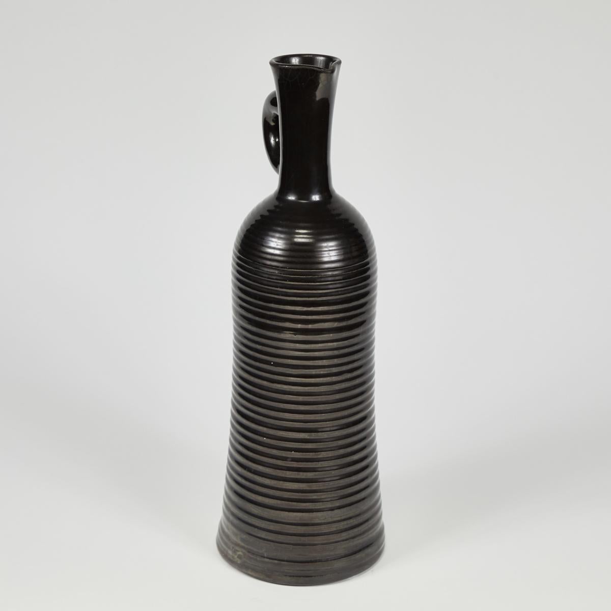 black on black ceramic vessel