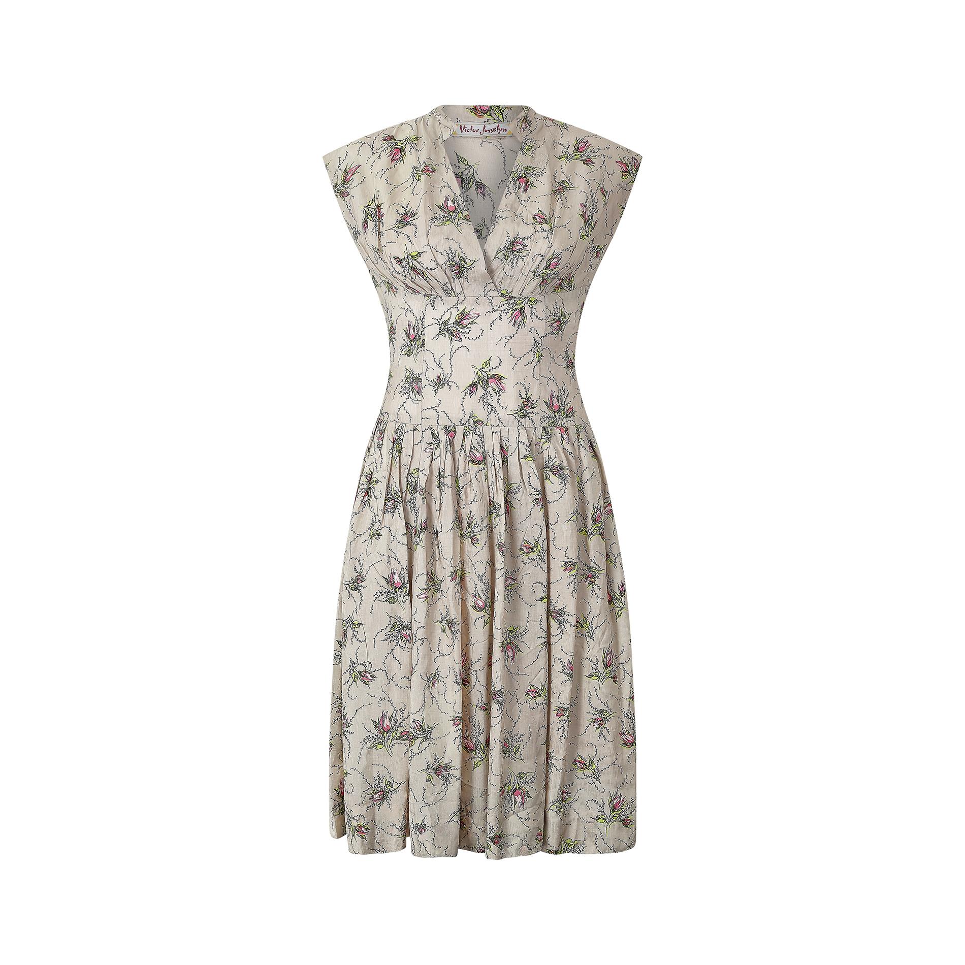Late 1950s to early 1960s piece by designer Victor Josselyn who used premium fabrics and production values to produce fashionable clothing for high end department stores in Great Britain during the 1940s - 1960s.  The dress is cut in a classic tea