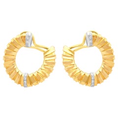1950s Vintage 0.21 Carat Diamond and Yellow Gold Twirl Earrings
