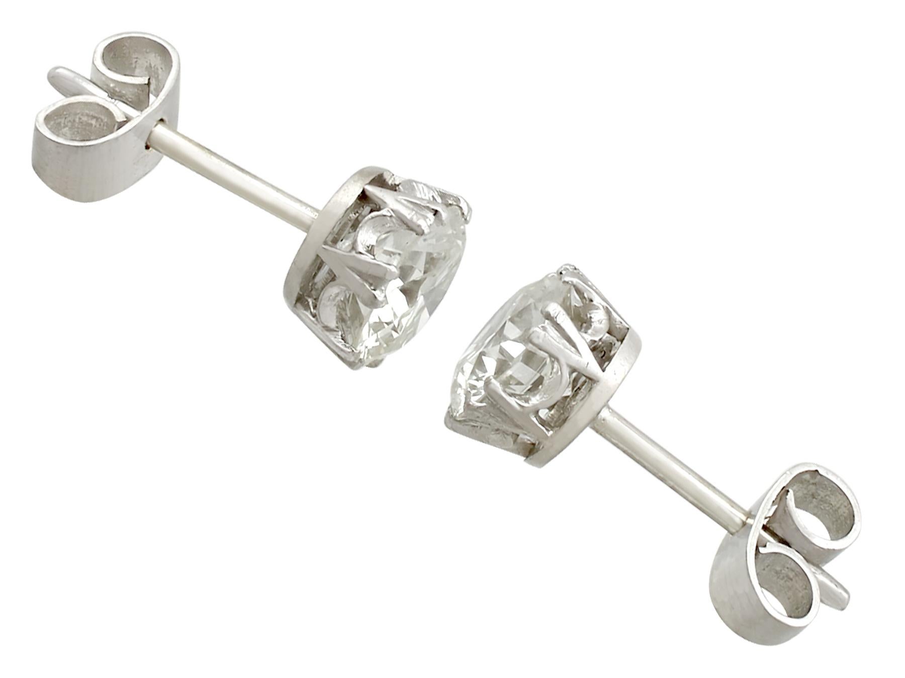 Round Cut 1950s 2.39 Carat Diamond and Platinum Stud Earrings