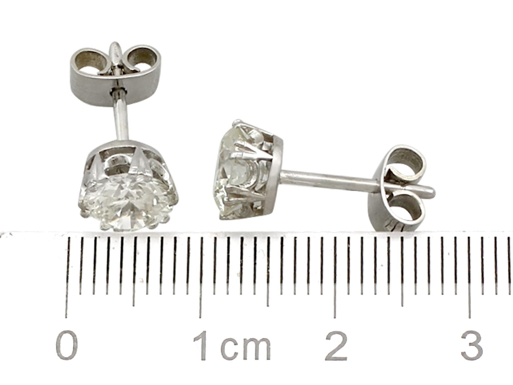 Women's or Men's 1950s 2.39 Carat Diamond and Platinum Stud Earrings