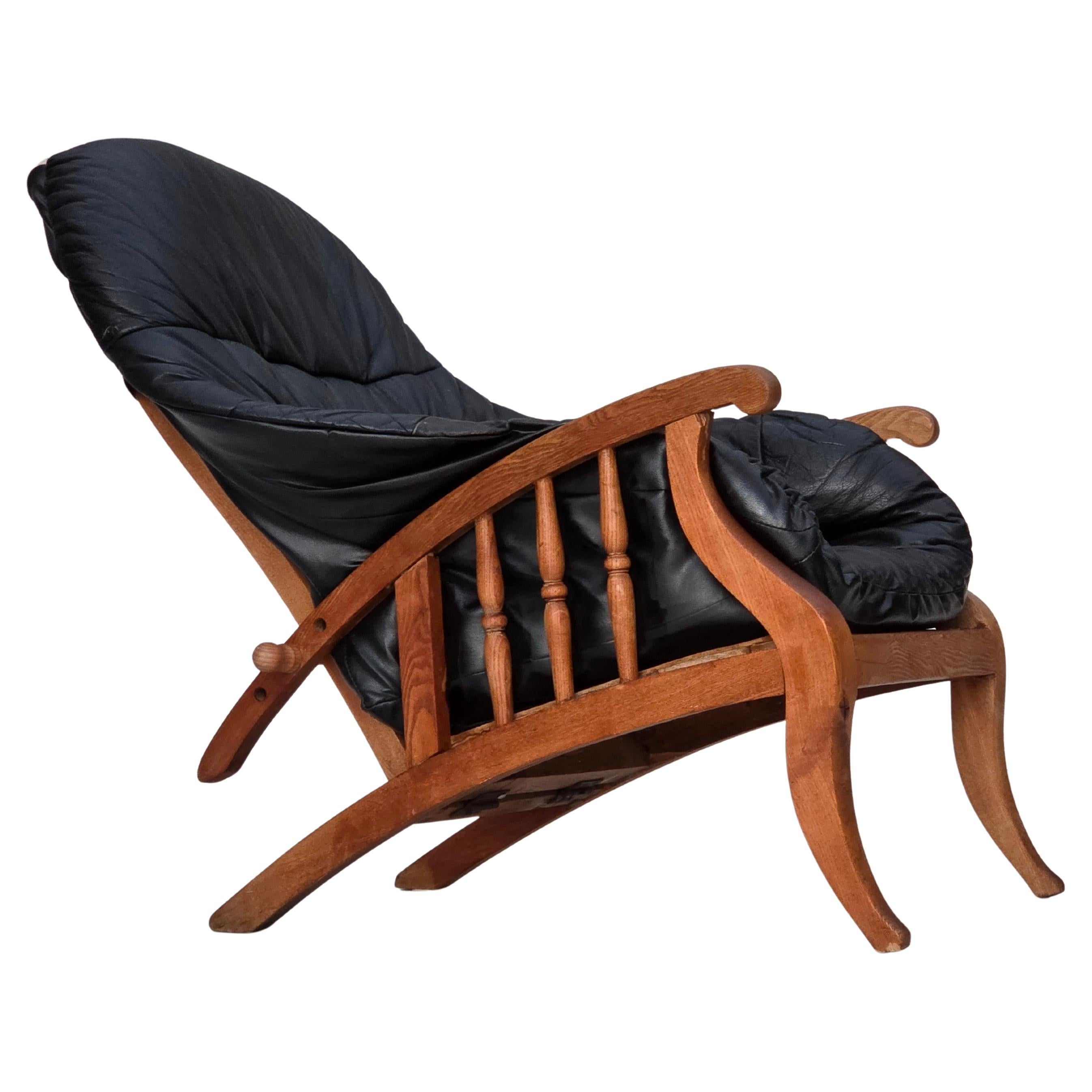1950s, vintage adjustable armchair, black leather, ash wood.