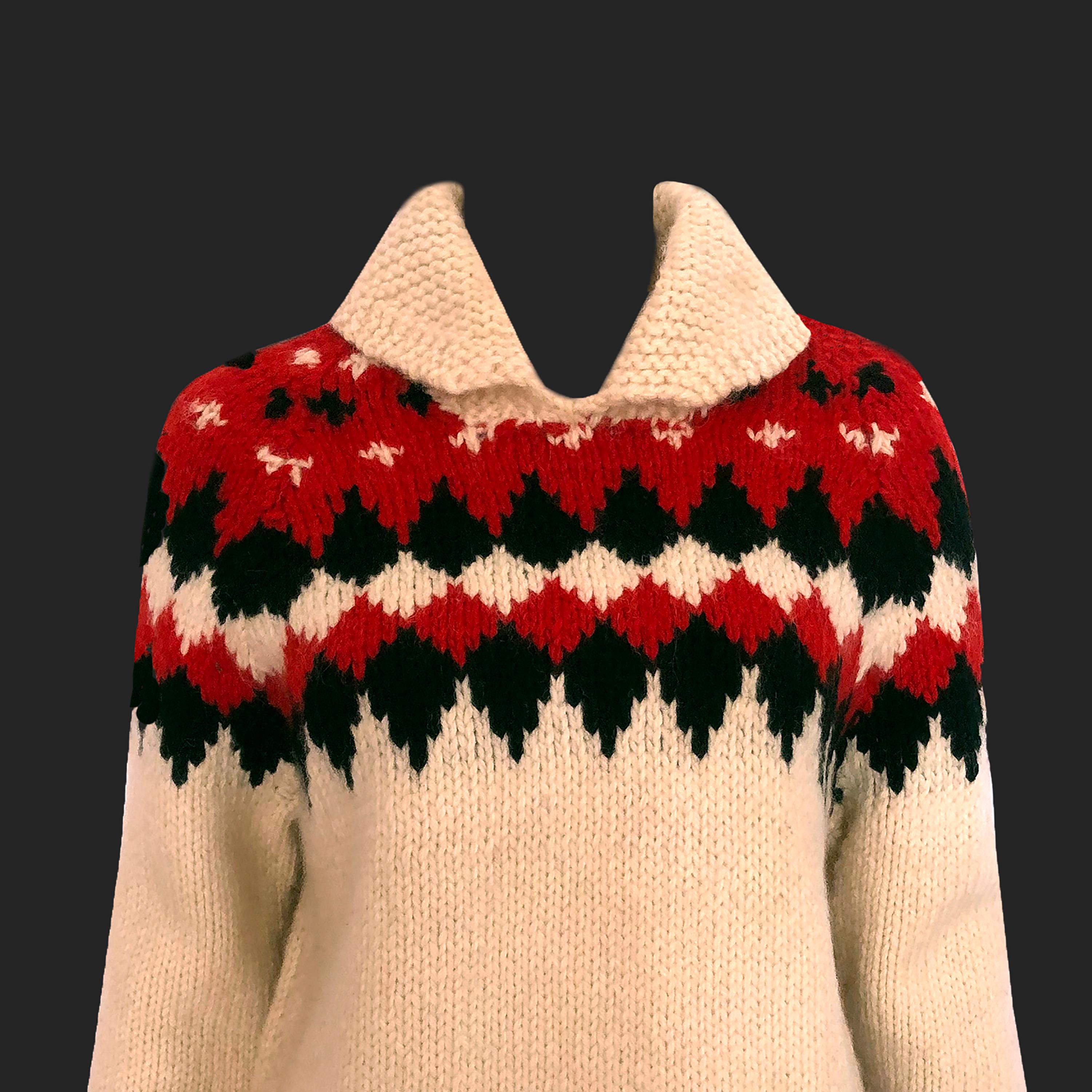 Product Details: 1950s Vintage - Alpine Knit Chunky Jumper - Red + Black Geometric Shoulder + Hem Pattern - Cream Knitted Main Body - Ribbed Collar, Cuff + Hem Detailing 
Era: 1950s Vintage 
Size: M (Fits UK 10 to UK 12)
Fabric Content: 100% Wool /