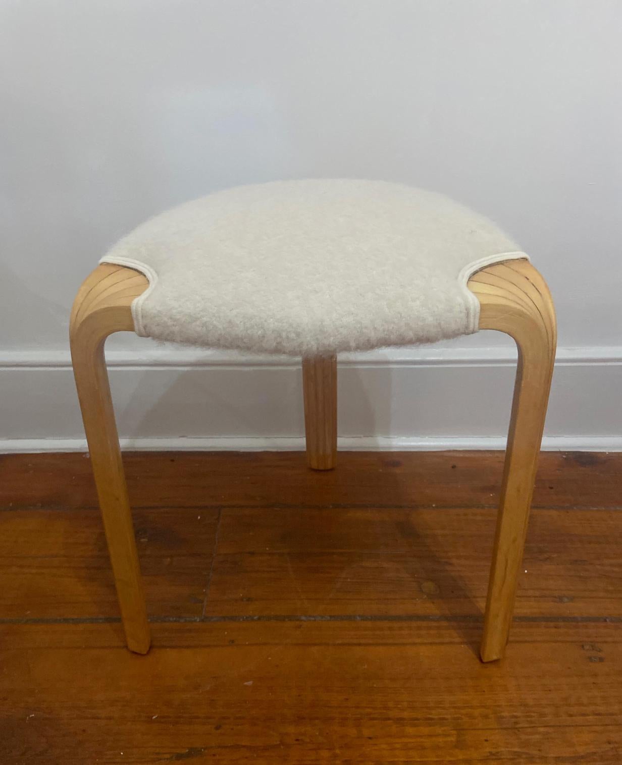 'Fan leg' stool, designed by Alvar Aalto. Manufactured by Artek, Finland, circa 1950. Reupholstered in a beautiful wool by Pierre Fre