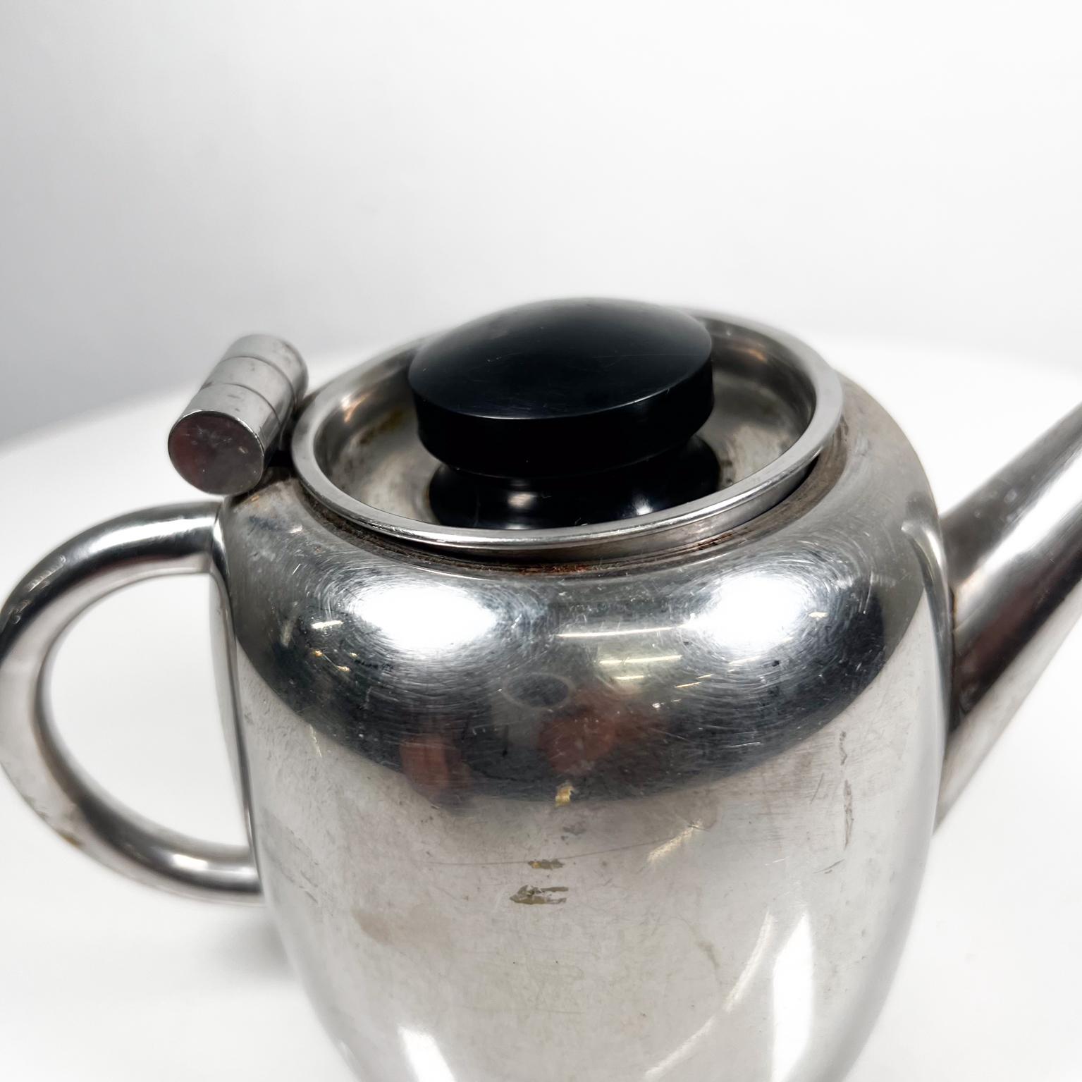 vintage metal teapots