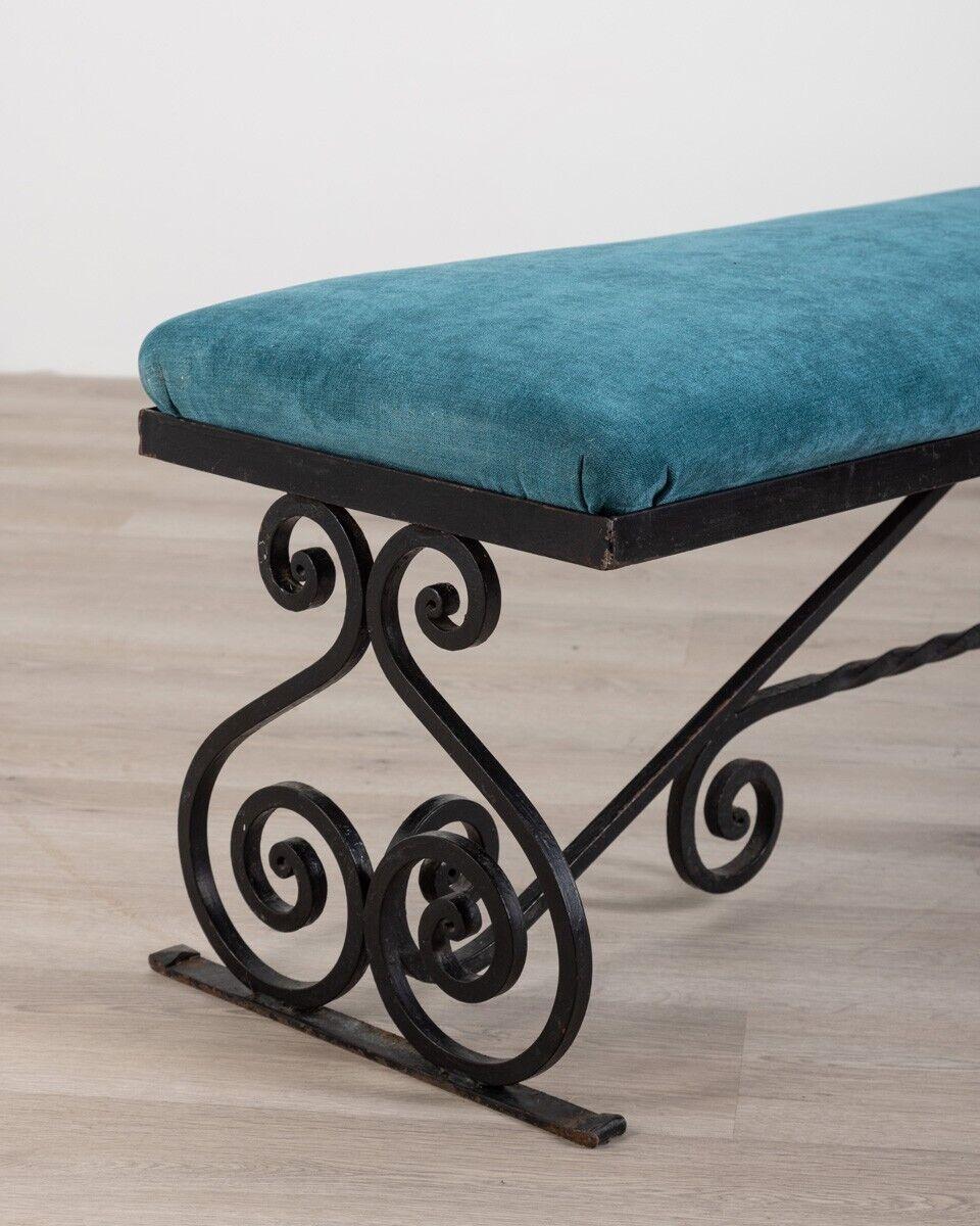 Bench with black iron structure and seat in blue fabric, 1950s.

CONDITION: In good condition, it may show signs of wear due to age, the seat has been reupholstered.

DIMENSIONS: Height 45 cm; Width 163 cm; Length 42 cm

MATERIALS: Iron and