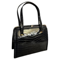 1950s Vintage Black leather and Brass Italian Top Handle Bag By Albanese Milano