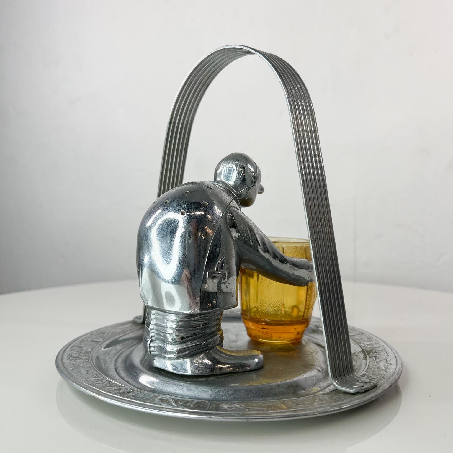 Mid-Century Modern butler Party Condiment serving dish chrome plate National Silver Company
Butler has slots on his back for toothpicks 
N S Co Chrome Plate maker stamp present
Measures: 9.63 diameter x 7.25 tall
Original unrestored vintage