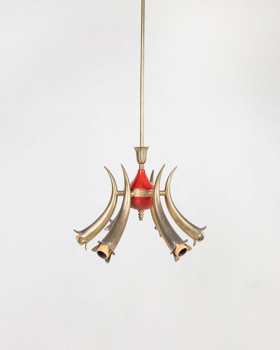 Six-light chandelier with red metal body and golden brass arms, 1950s.

Conditions: In good condition, working, it shows signs of wear due to time.

Dimensions: Height 93 cm; Diameter 34 cm

Materials: Metal and Brass

Year of production: