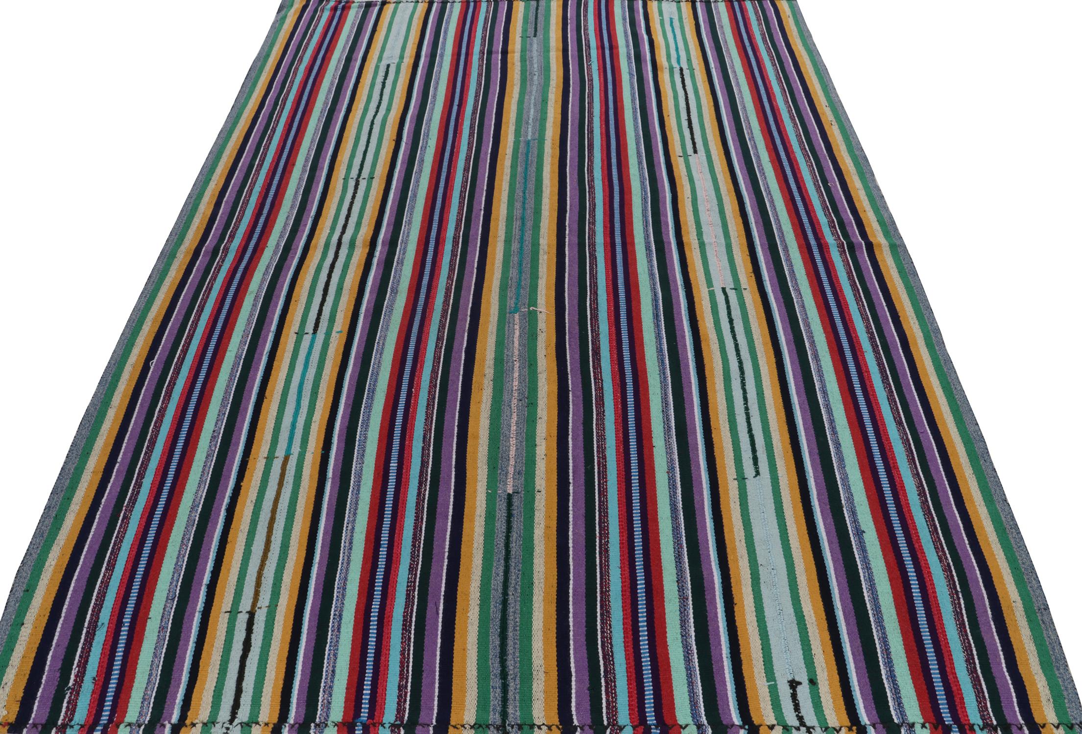 Coming from Turkey circa 1950-1960, a bold type of chaput kilim rug style now entering our vintage flat weave curations. Boasting fine detailing with the colors within the polychromatic stripes, the light & refreshing piece plays predominantly in