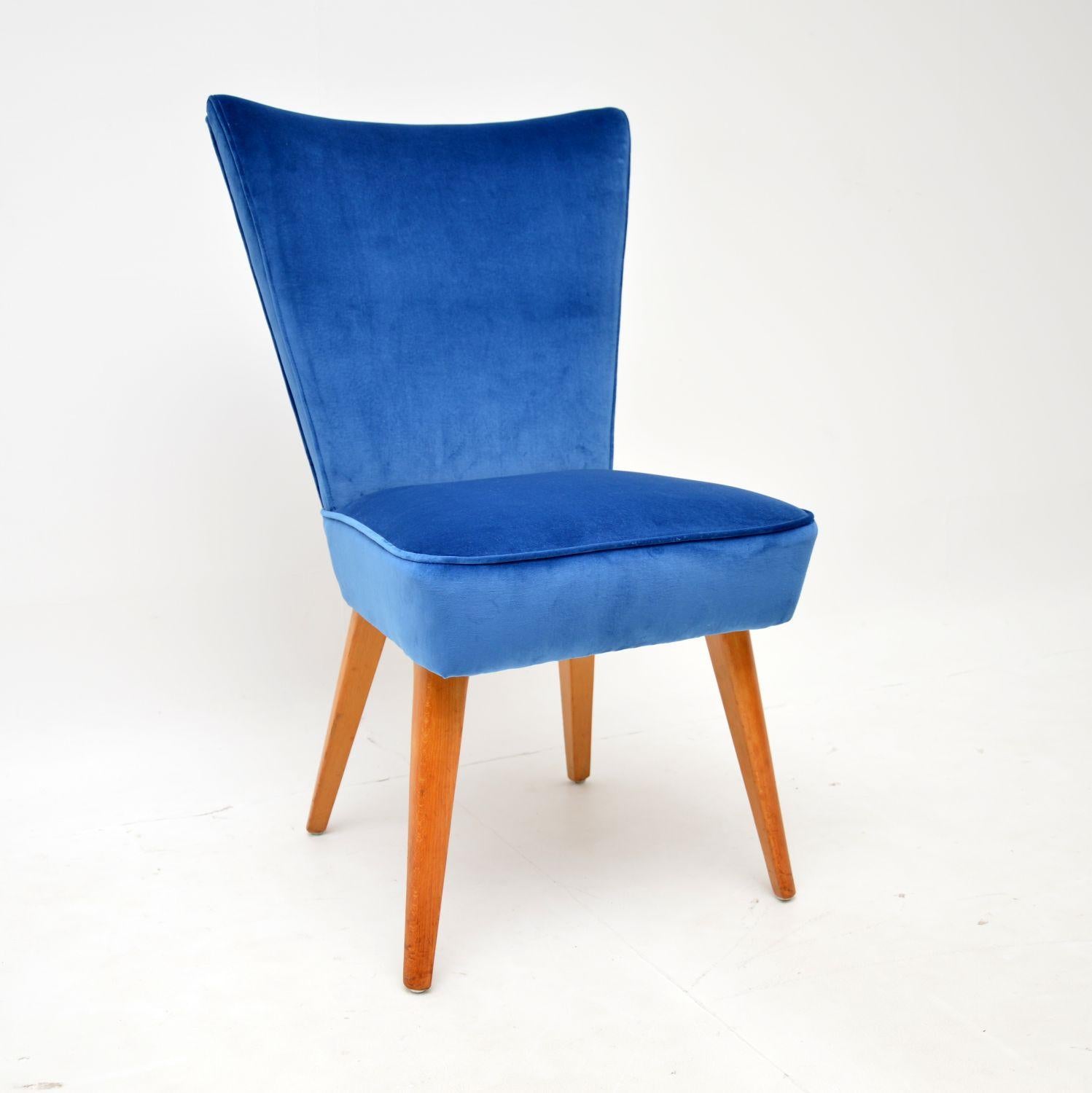 A beautiful and elegant vintage cocktail chair, this was made by Howard Keith, it dates from the 1950’s.

This has an incredibly stylish designed, with a fan shaped back rest and beautifully tapered legs.

We have had this newly upholstered in a