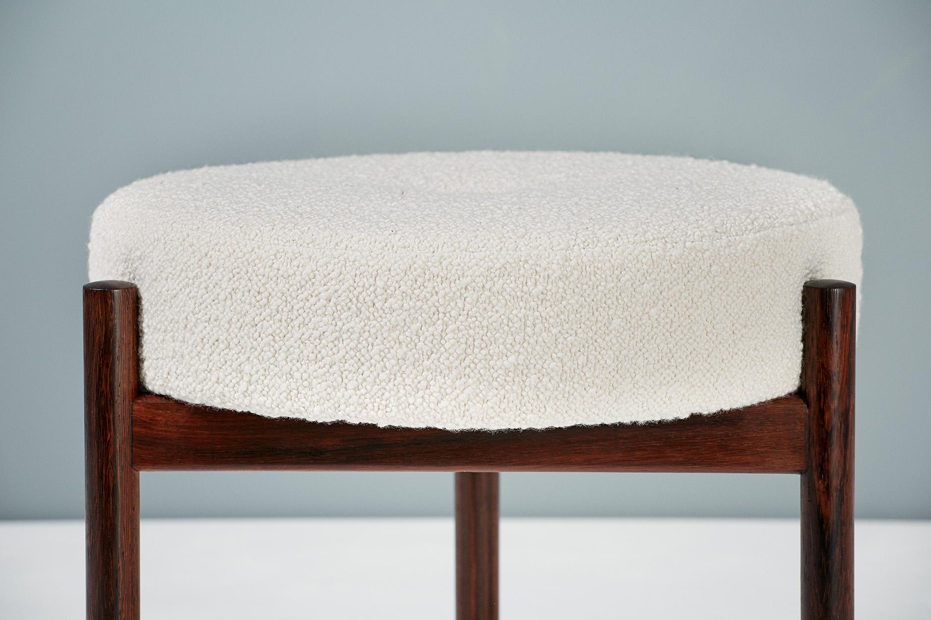 Spottrup Mobler

Round ottoman, 1950s

3-leg rosewood frame with round seat pad covered in new Italian bouclé wool fabric. 

 