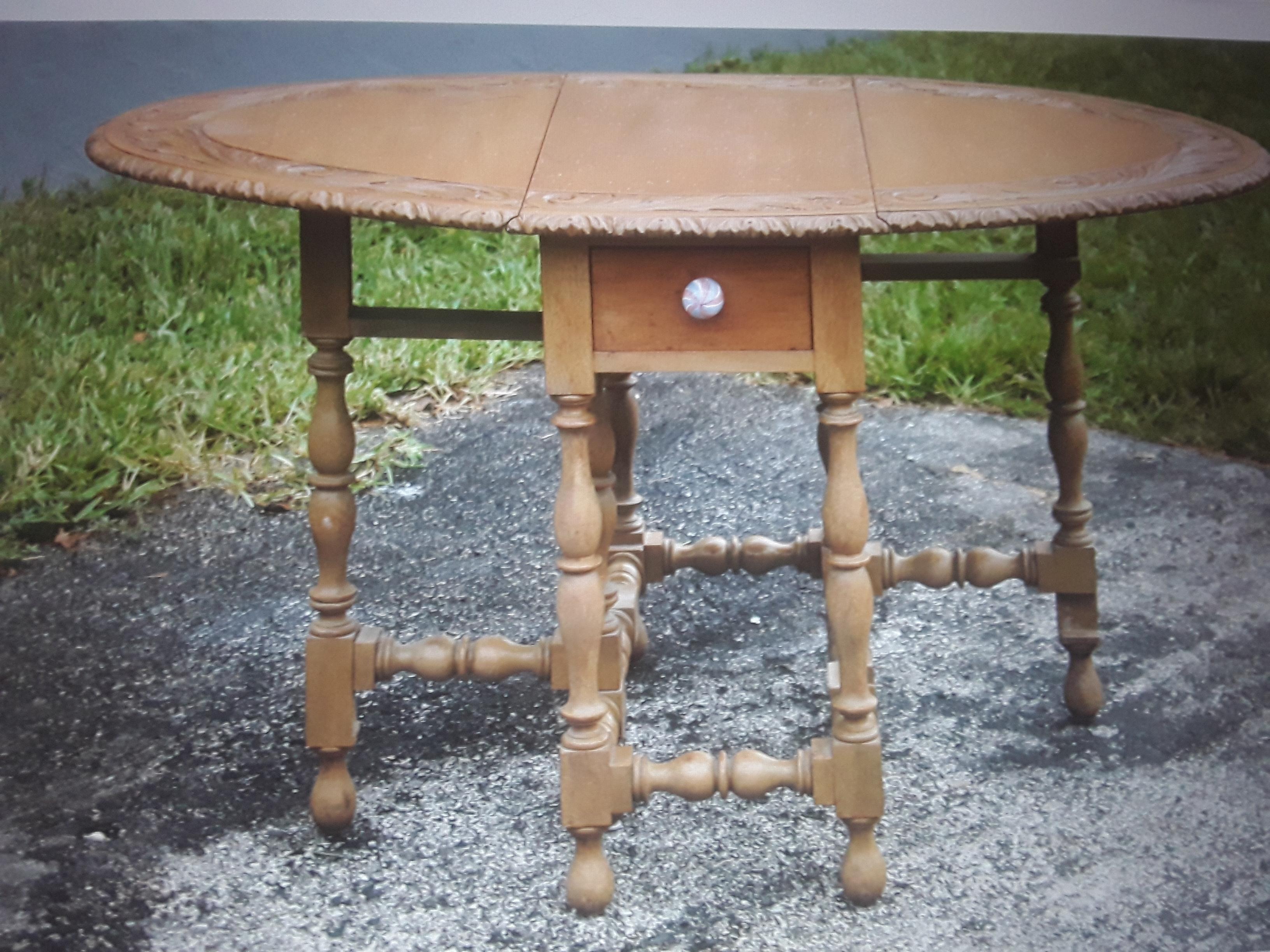1950's Vintage Drop Side Dining Table. Masterfully carved. Turned wood detail.