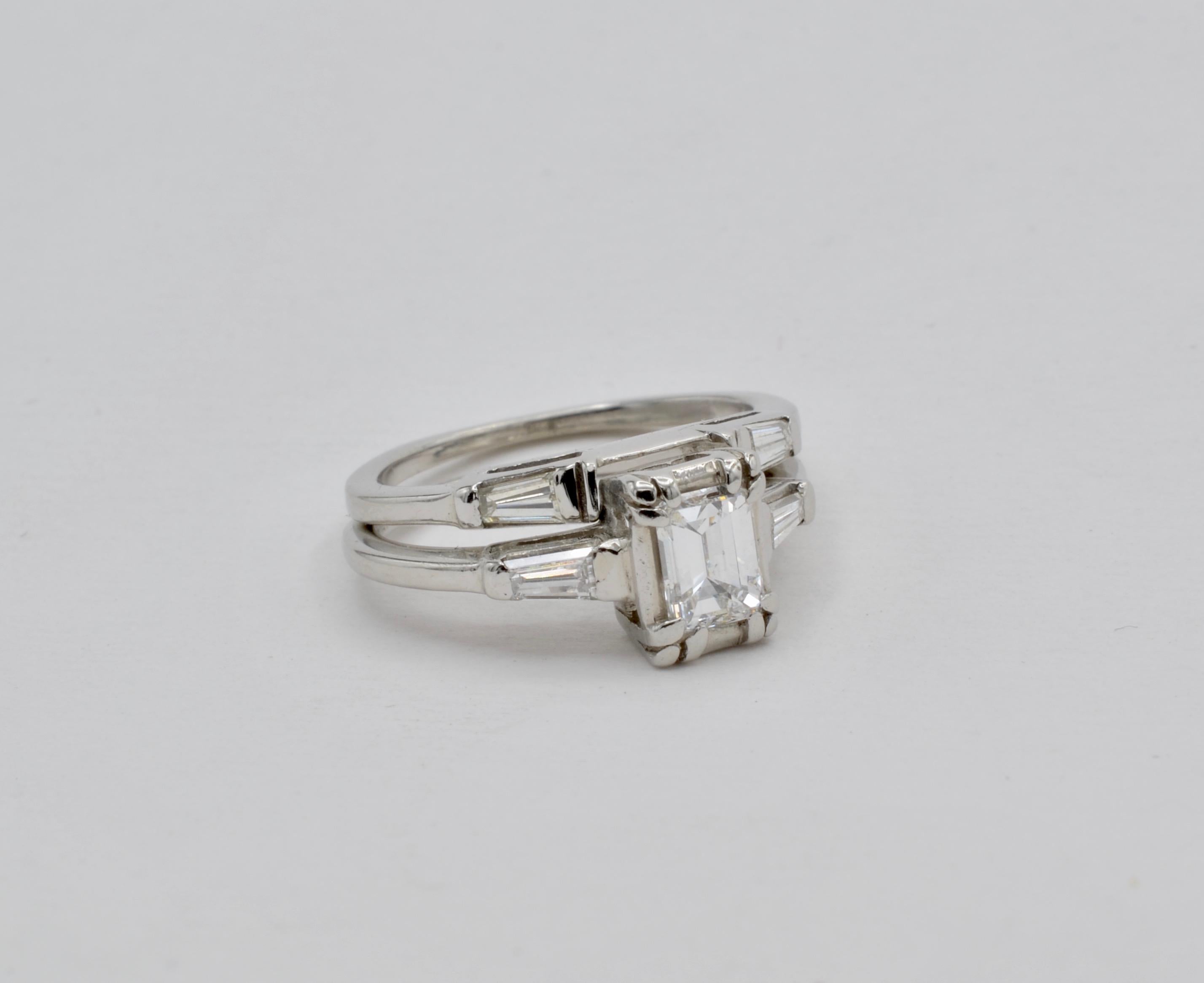 This wedding set is from the 1950's and the style considered Modern for the period. The center diamond is emerald cut .60 ct. The color is D which is colorless. The quality is SI1. There are two diamond baguette on either side of this magnificent