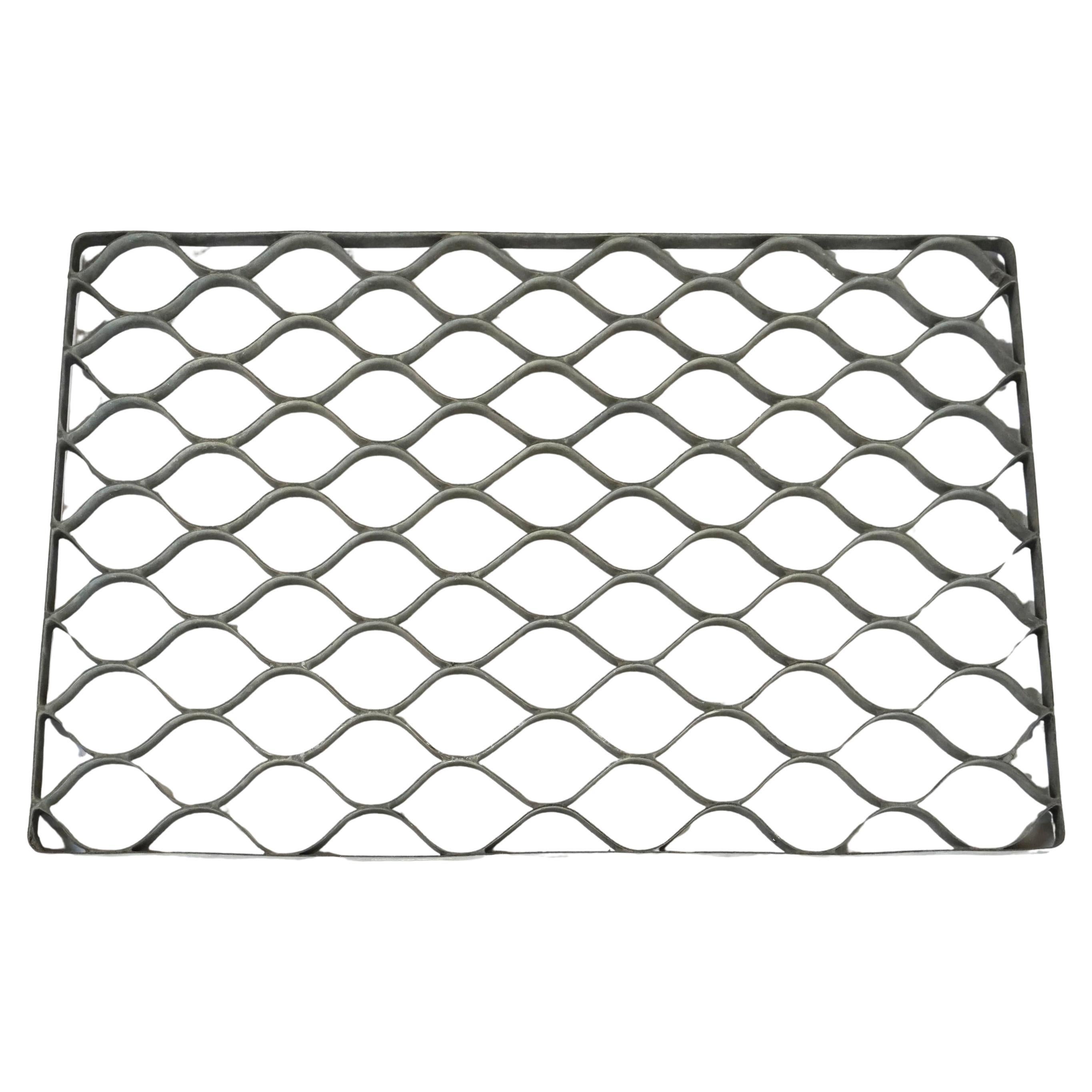 Felpudo de puerta de metal galvanizado vintage de los años 50