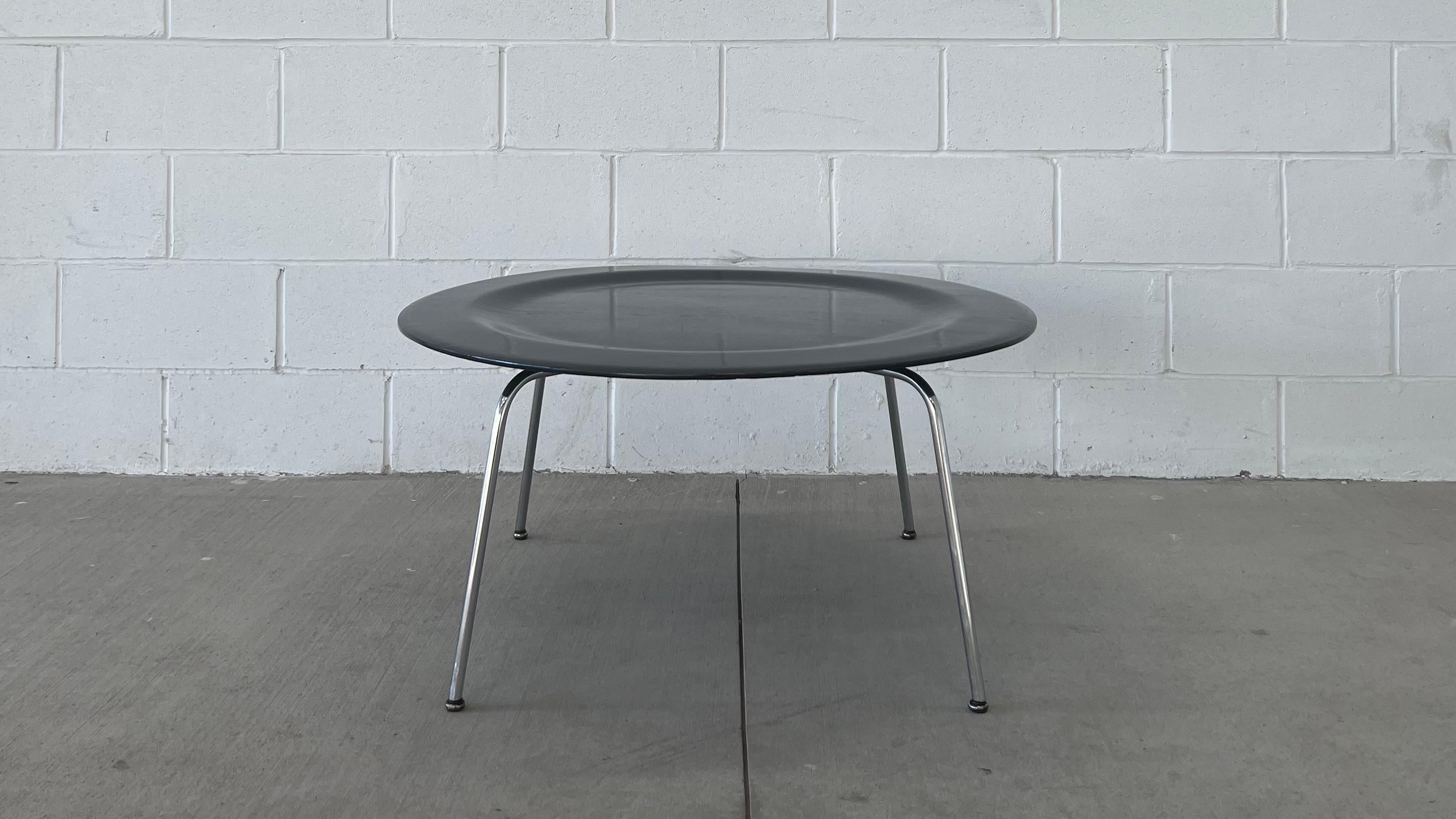 Third generation black CTM by Ray and Charles Eames for Herman Miller. No label. Retains original feet. 

Likely produced in 1950 (due to the domes of silence) as opposed to a later third generation model which was in production up until 1957.