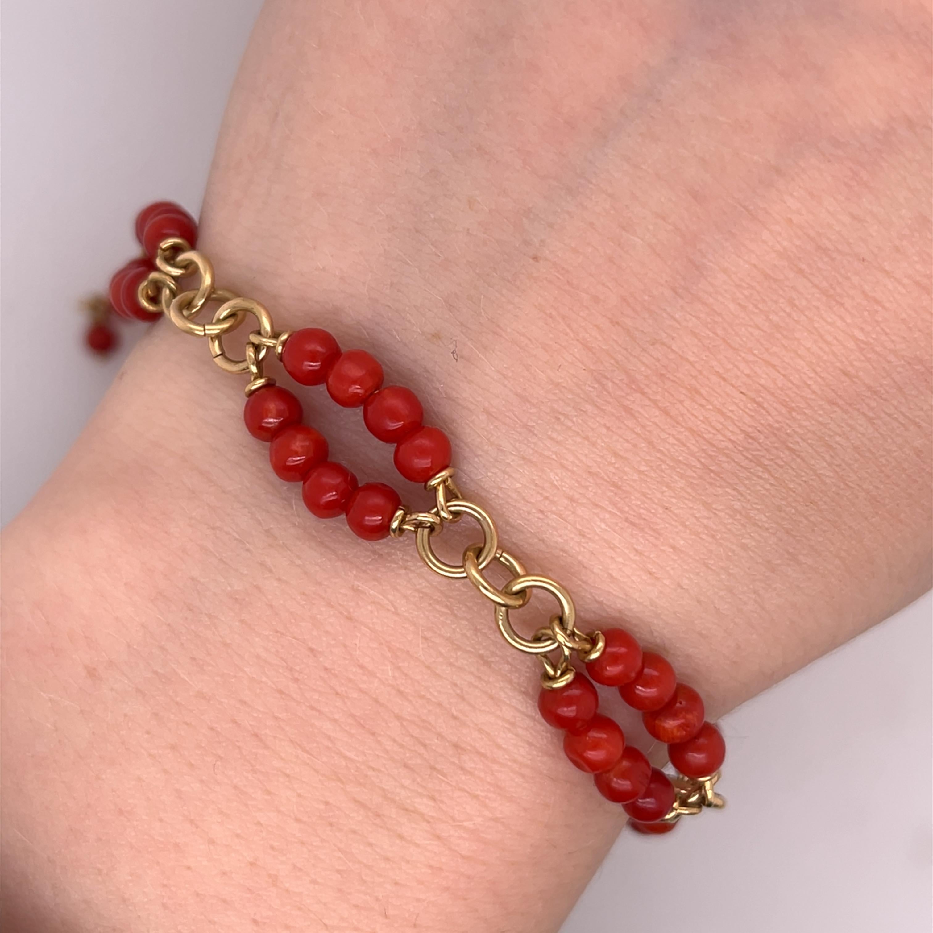 A stunning 1950s vintage Italian bracelet, beautifully crafted in solid 18ct yellow gold and adorned with exquisite natural coral. 
This elegant piece showcases the refined craftsmanship of mid-century Italian jewellery, making it a true collector’s