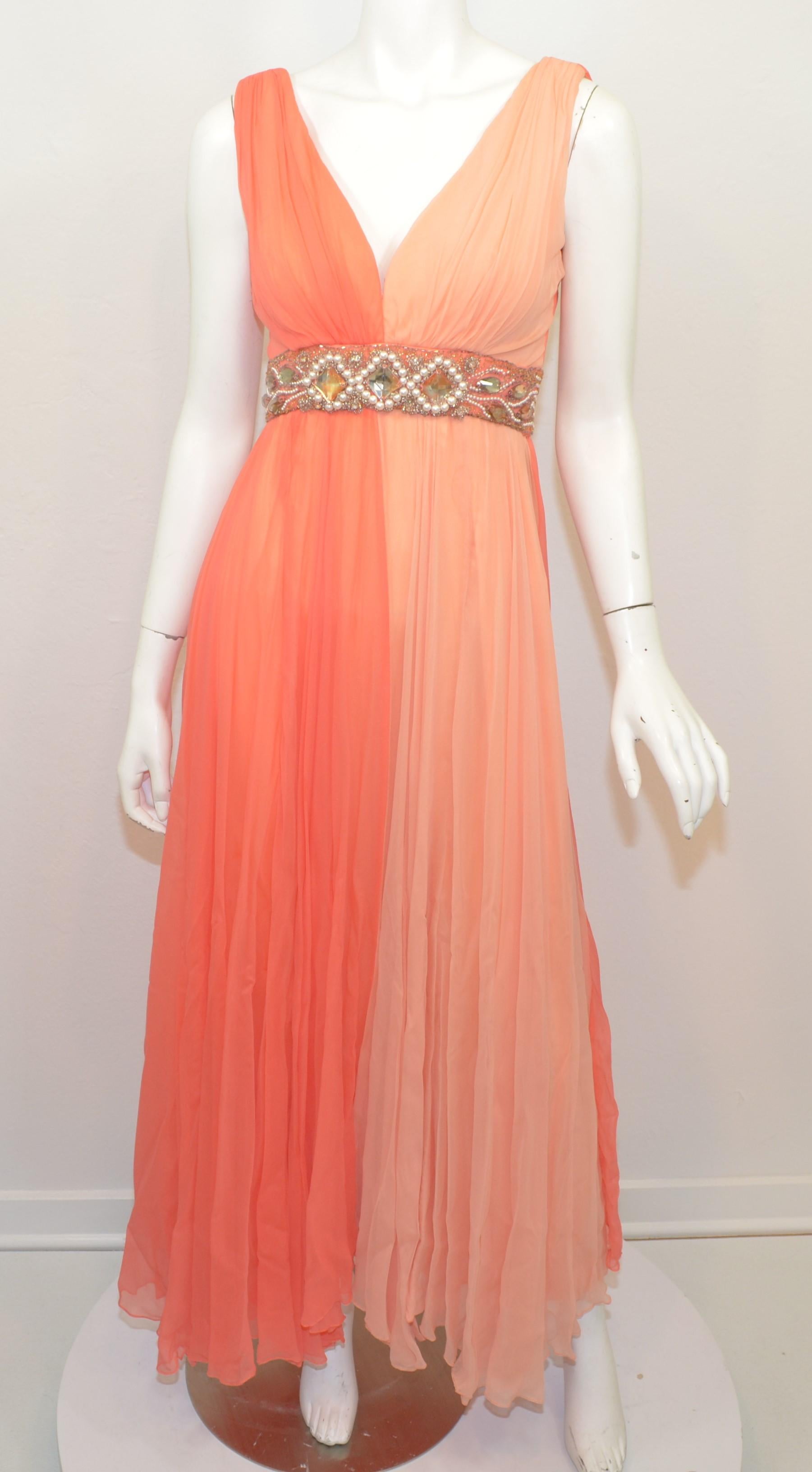 1950's Vintage Judd’s Coral Dress with Bead Embellishing -- Coral-colored chiffon gown features a beaded waist band, v-neckline leading through the back with a zipper fastening. Dress is full lined and is in excellent vintage