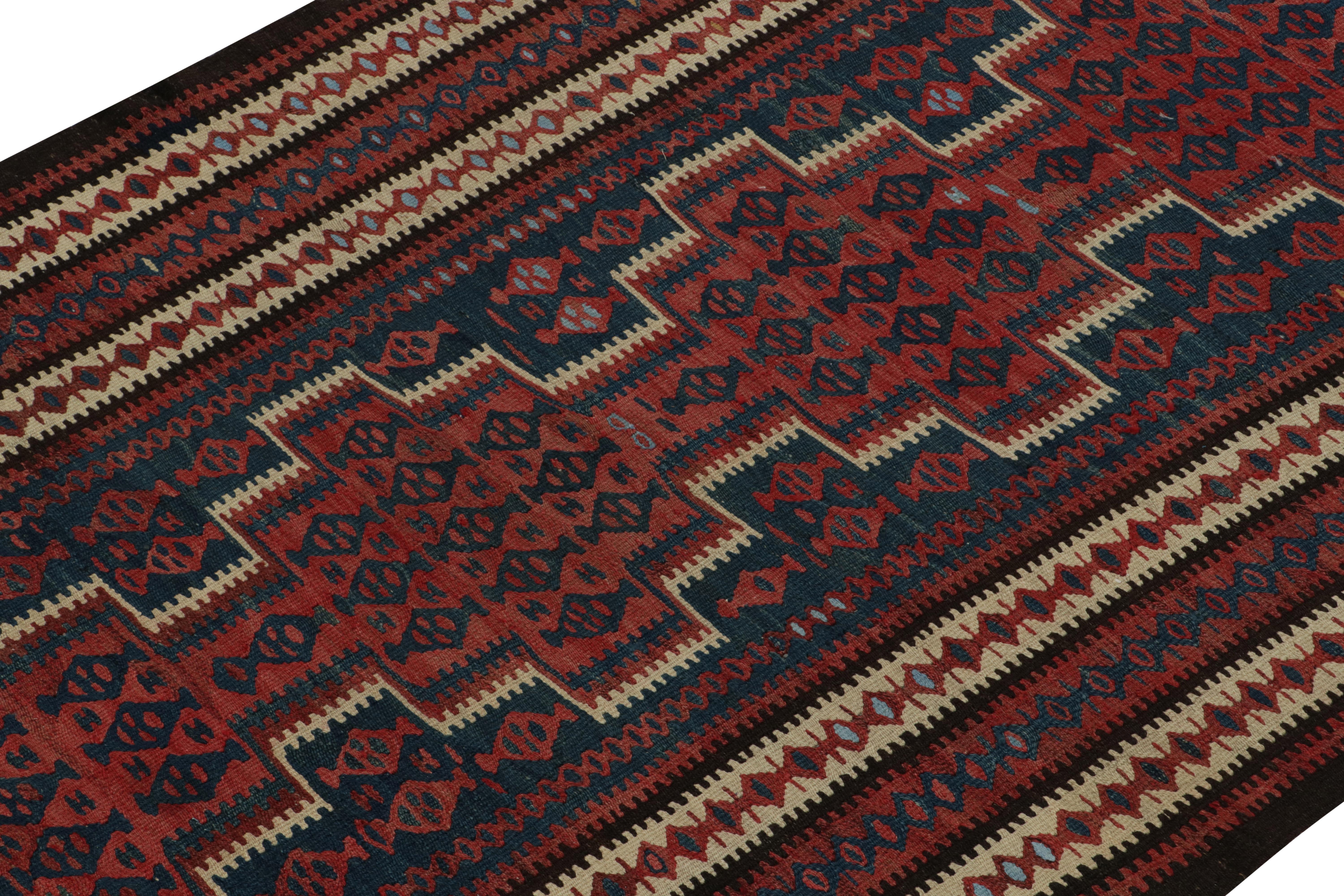 Tribal 1950s Vintage Kilim Rug in Red, Blue and Brown Geometric Patterns by Rug & Kilim For Sale