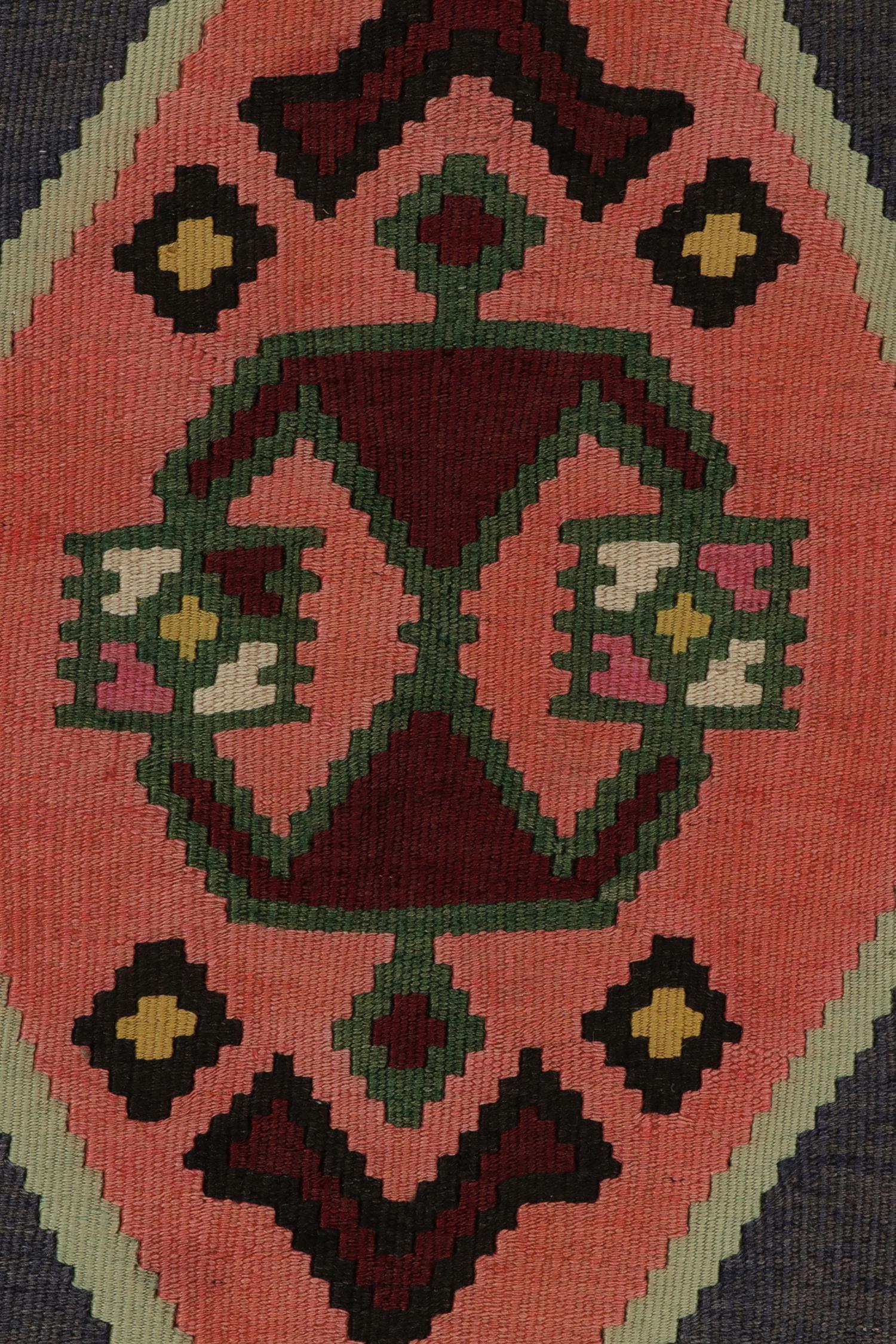 Hand-Knotted 1950s Vintage Kilim rug with Pink , Vibrant Geometric Pattern by Rug & Kilim For Sale