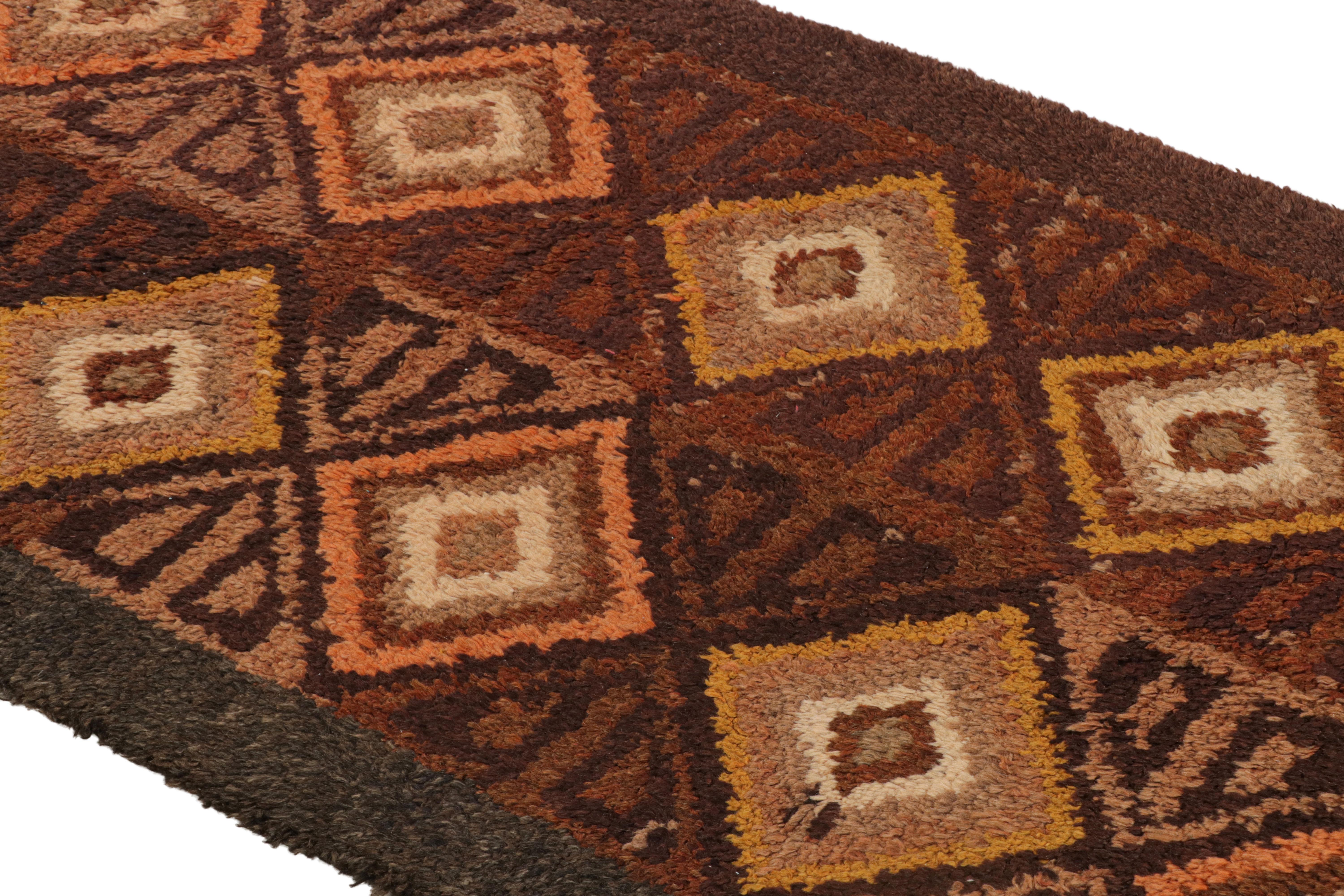 Handmade in hand knotted wool circa 1950-1960, this midcentury rug is a rare selection from a series of antique and vintage high pile runners our principal Josh has discovered from Iraq—though the sensibility reads with a similar tribal rug