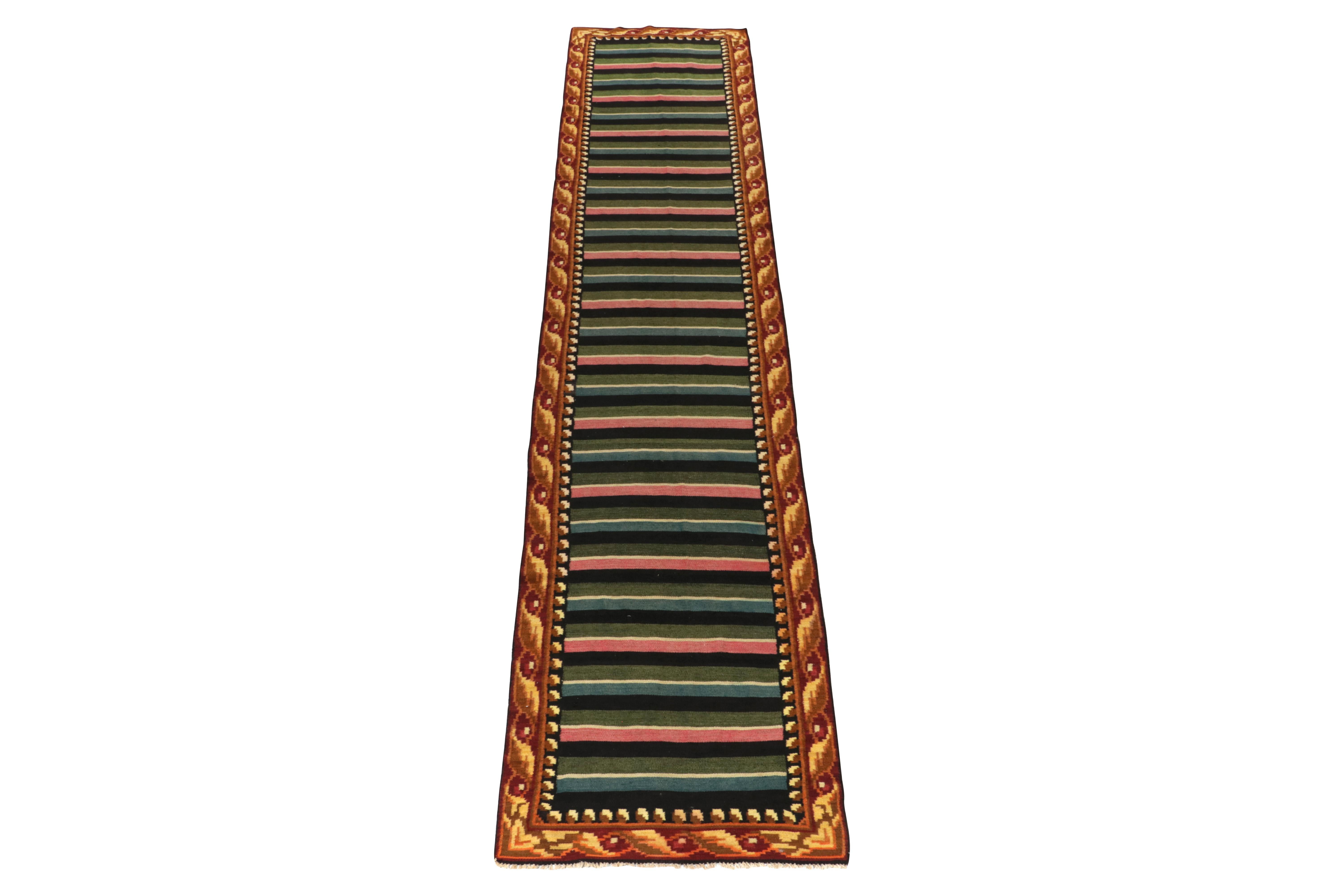 Handwoven in wool, a rare 3x16 Moldovian kilim runner from our vintage selections enjoying one-of-a-kind geometry. 

Belonging to the 1950s, the piece enjoys an exclusive length and polychromatic stripes carrying a more modern appeal given the era