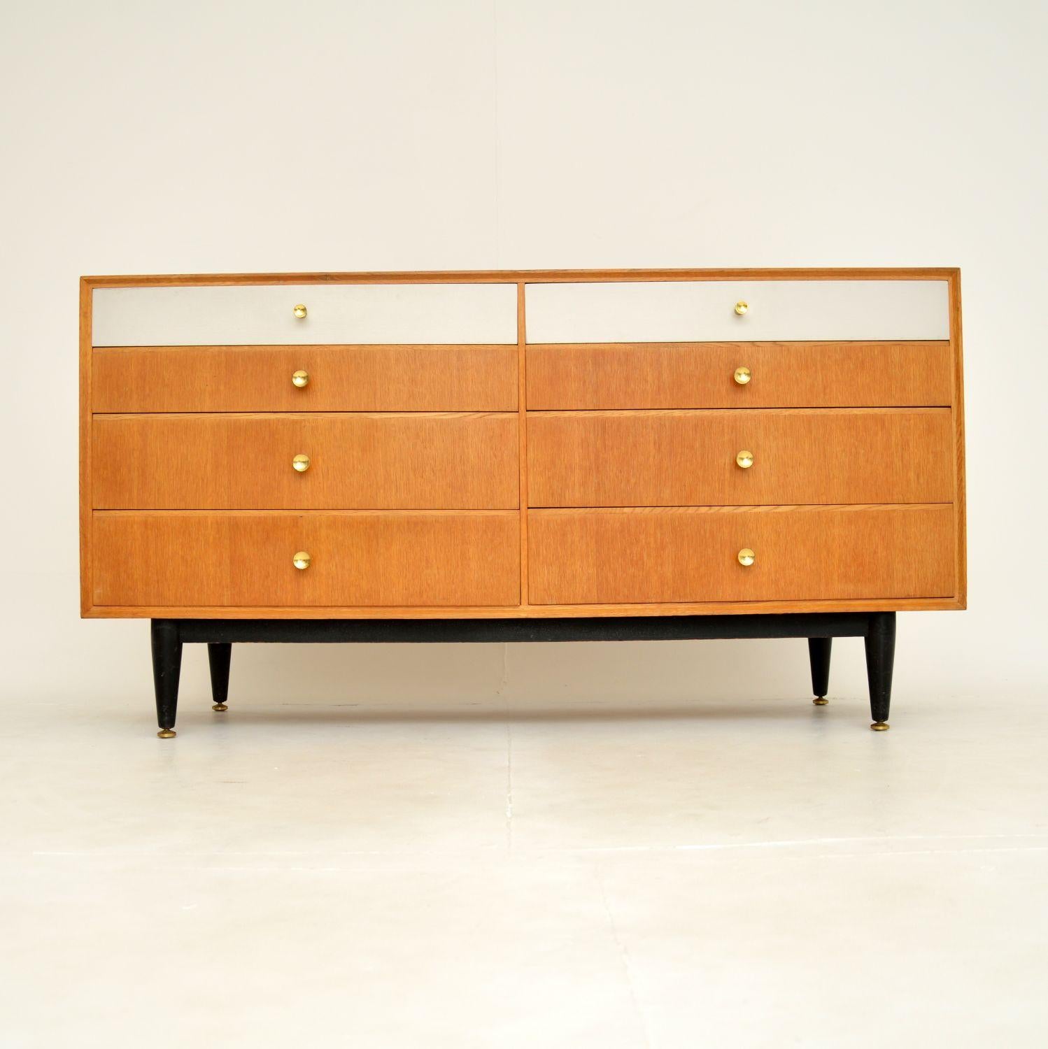 A very stylish and well made sideboard / chest of drawers in light oak. This was made in England by Meredew, it dates from around the 1950-60’s.

The quality is excellent, this is beautifully styled and is a very useful item. There is lots of