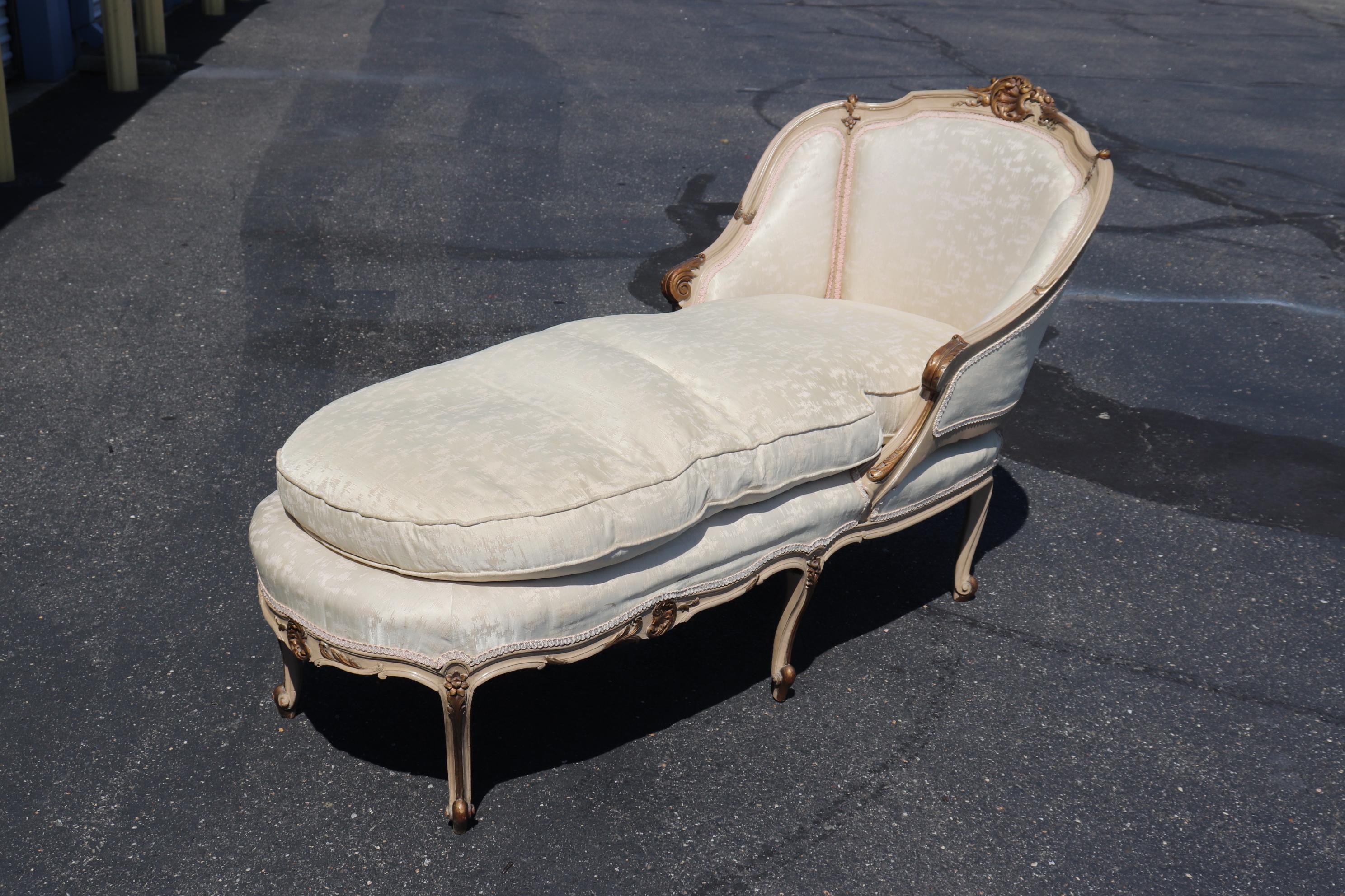 This is a gorgeous chaise measuring 63 wide x 29 deep x 37 tall and the seat height is 19 inches. The piece has gold accents on a off- white frame.