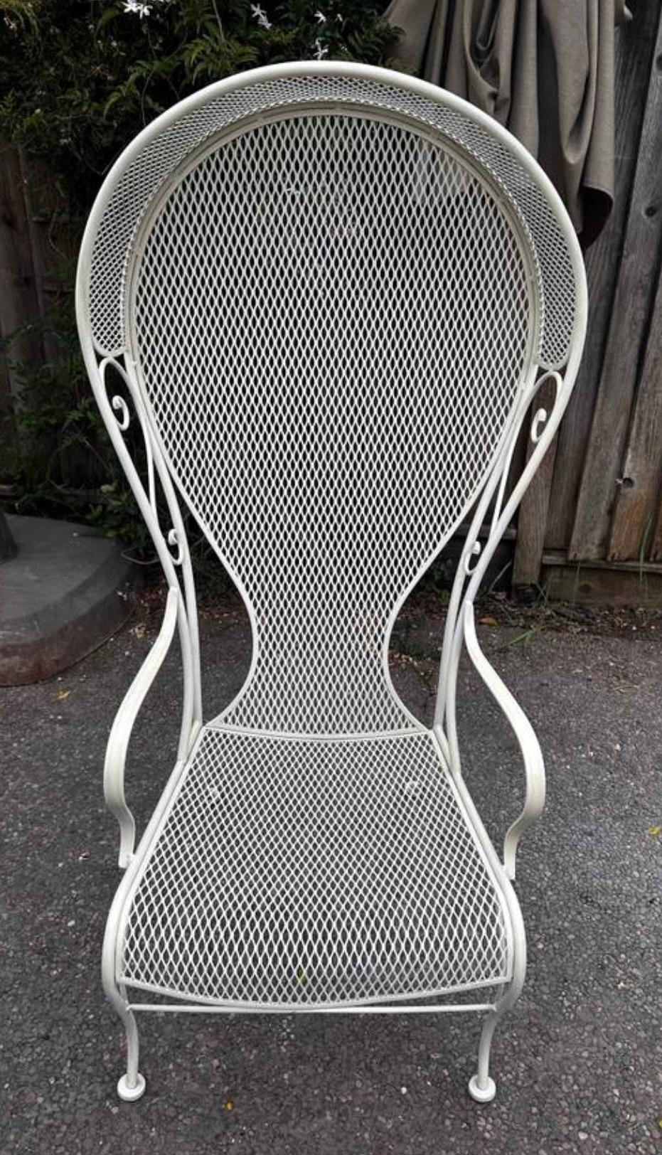 1950s Vintage Russell Woodard Beige Iron
Hooded Porter Garden canopy princess chair

Cross mesh pattern with exaggerated scrollina and canopy top with corseted backs, also know as the Princess chair in satin beige.

Dimensions
Height: 56 in. (142.24