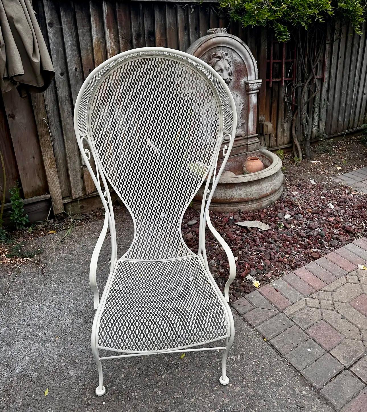 1950s Vintage Russell Woodard Beige Iron
Hooded Porter Garden canopy princess chair

Cross mesh pattern with exaggerated scrolling and canopy top with corseted backs, also know as the Princess chair in white color.

Dimensions
Height: 56 in. (142.24