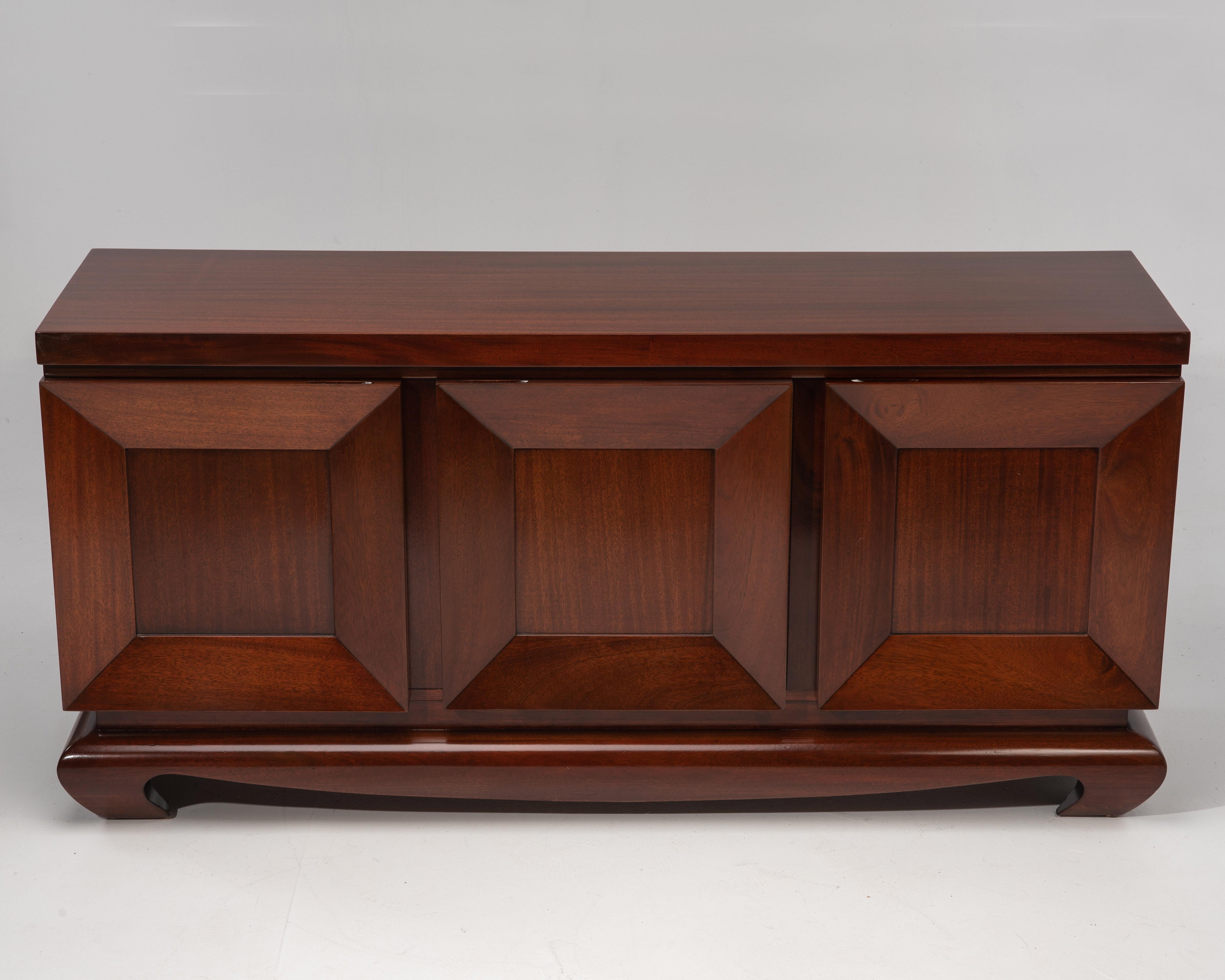 Picture frame credenza by Seth Ben-Ari of Scotch Plains, New Jersey. Clear, straight grain mahogany wood case with three doors. The right door conceals three drawers, the center and left doors open to conceal a shelf. Impeccable craftsmanship, 1950s.