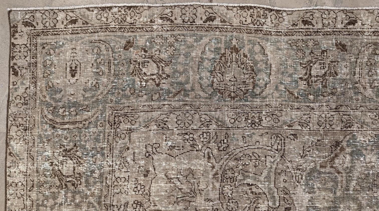 Vintage Tabriz rugs, you can focus on their craftsmanship, artistry, historical value, and versatility. Their intricate patterns, whether overall floral or medallion provide visual harmony.