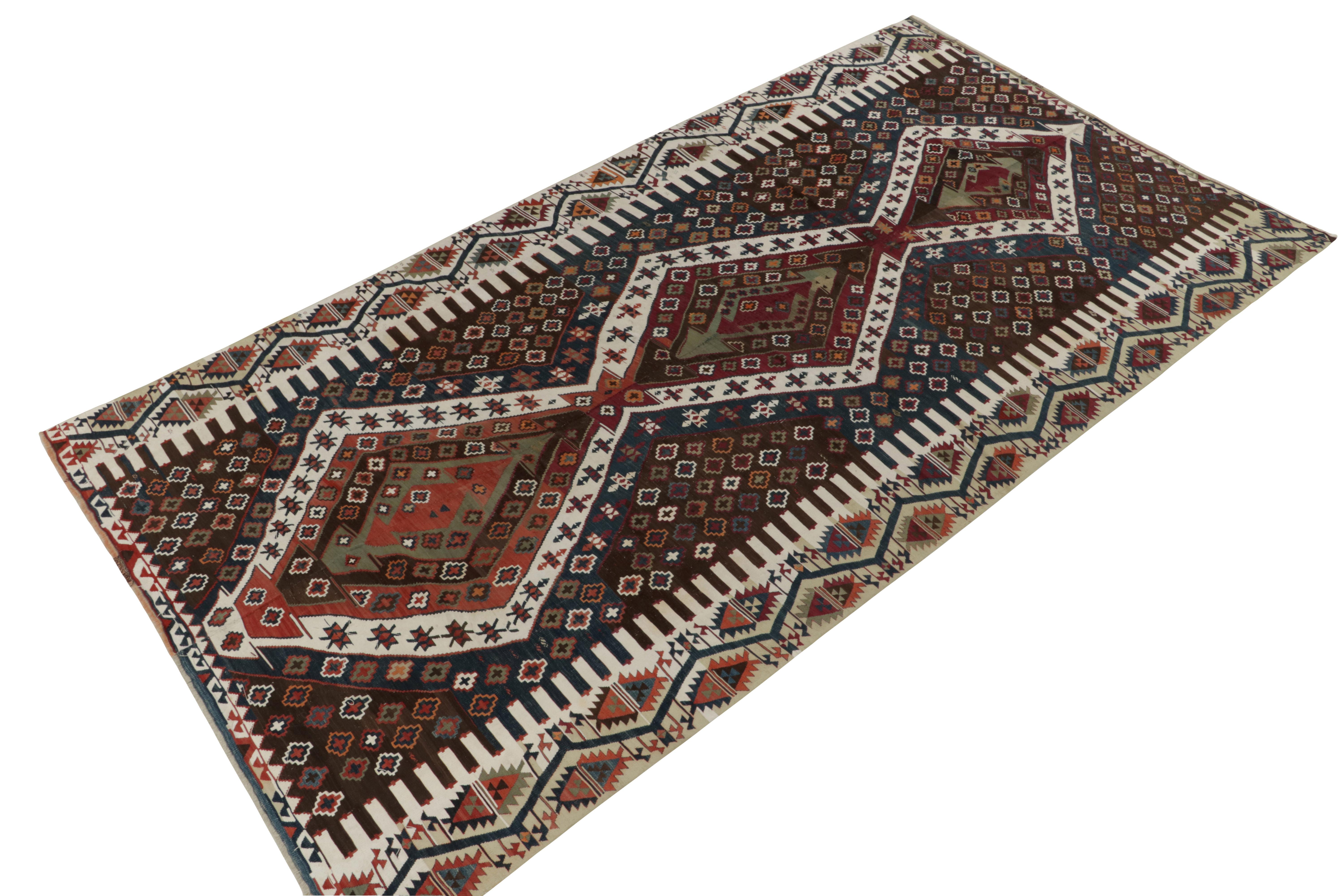 Hailing from rare turkish lineage of the Malatya region circa 1950-1960, a mid-century kilim rug newly unveiled from Rug & Kilim’s most coveted vintage selections. 

On the Design: The vision enjoys an intricate diamond-arrow design in deep blue