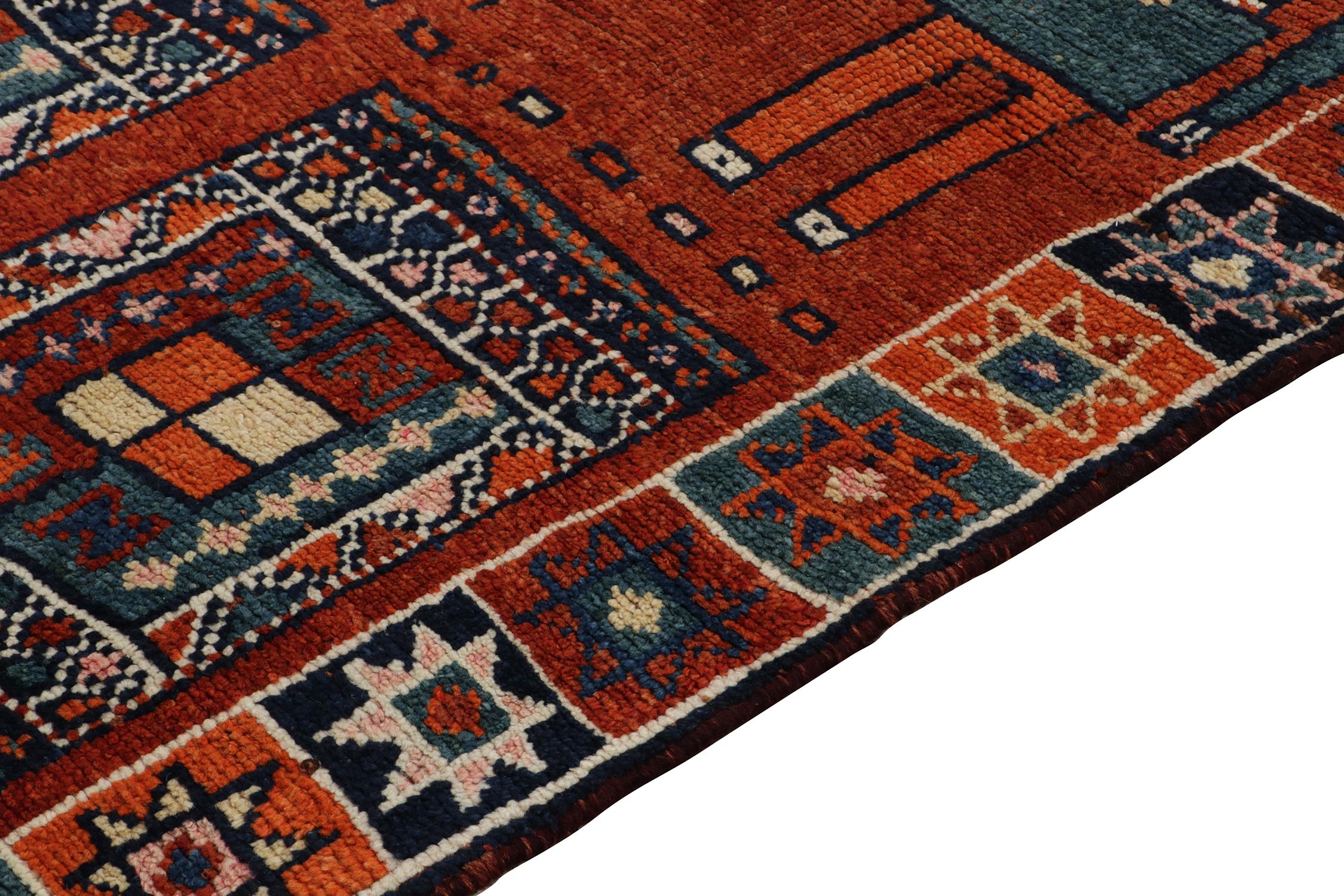 Hand-Knotted 1950s Vintage Tribal Rug in Orange, Red and Blue Pictorial Patterns For Sale