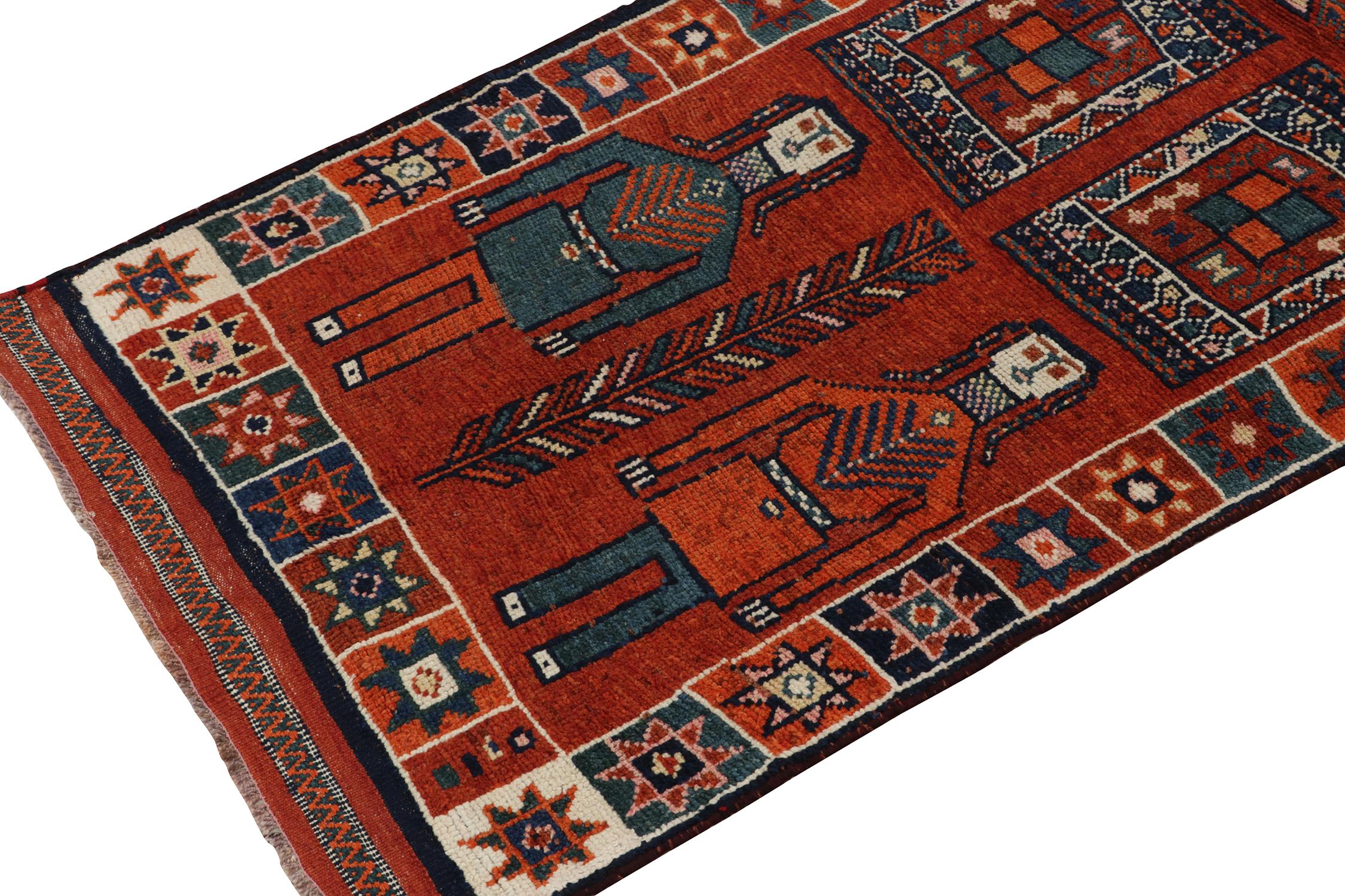 1950s Vintage Tribal Rug in Orange, Red and Blue Pictorial Patterns In Good Condition For Sale In Long Island City, NY