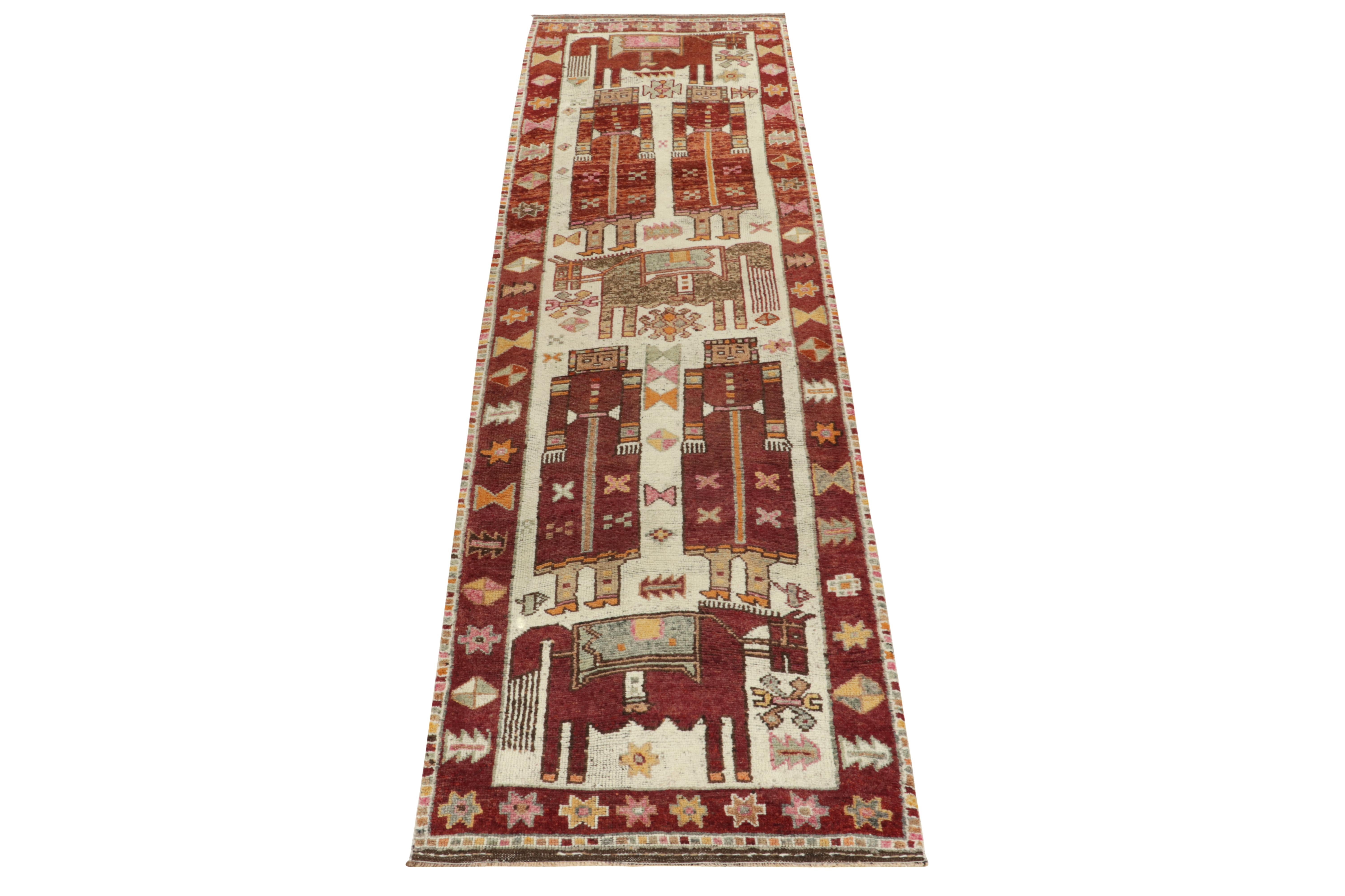 Hand-knotted in wool, a 4x13 runner from Rug & Kilim’s newly unveiled curation of iconic tribal pieces. Originating from Turkey circa 1950-1960, a graphic piece as collectible as it is rich. 

 The design enjoys human & horse pictorials in rich