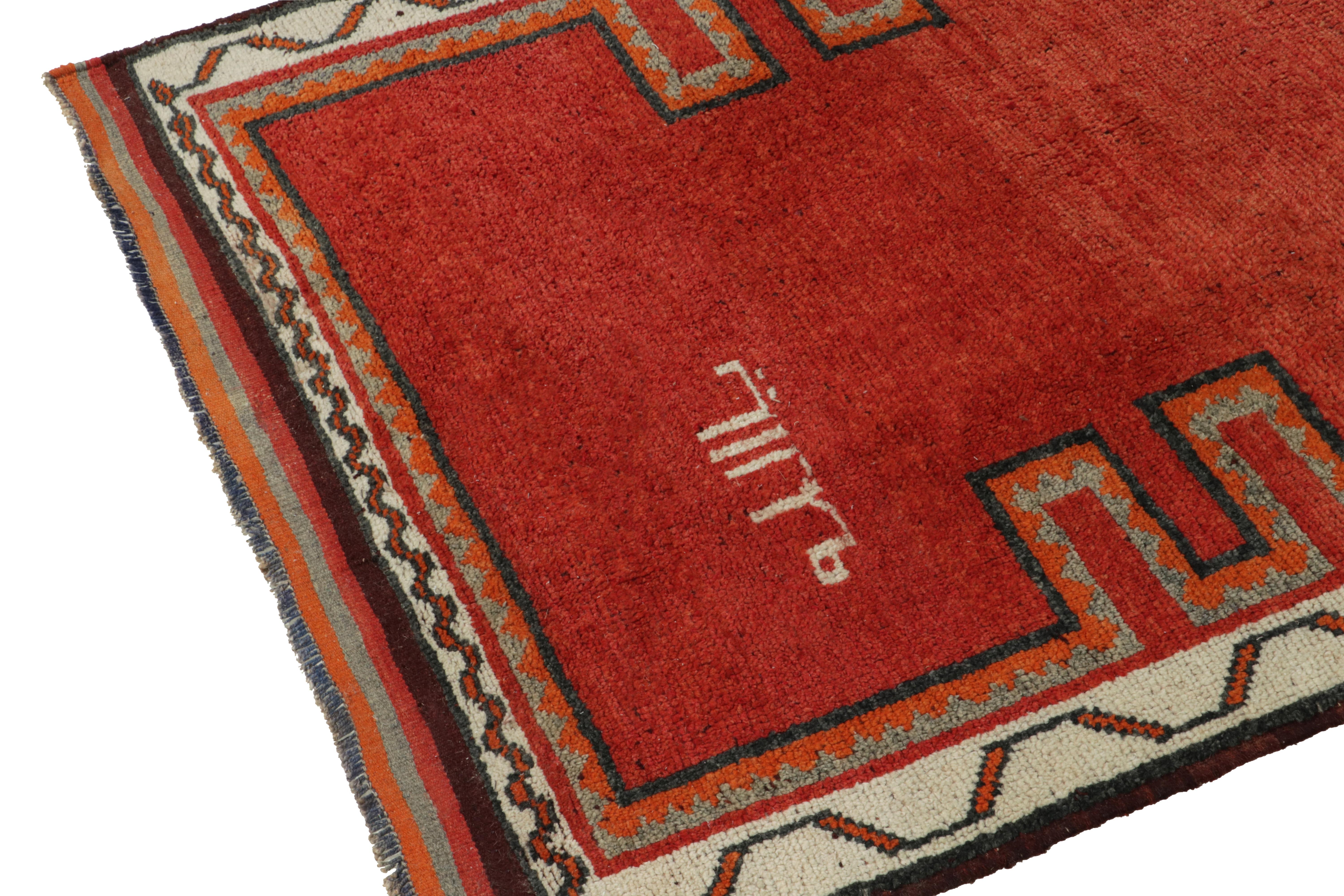 Hand-Knotted 1950s Vintage Tribal Rug in Red Open Field Brown Geometric Border by Rug & Kilim For Sale