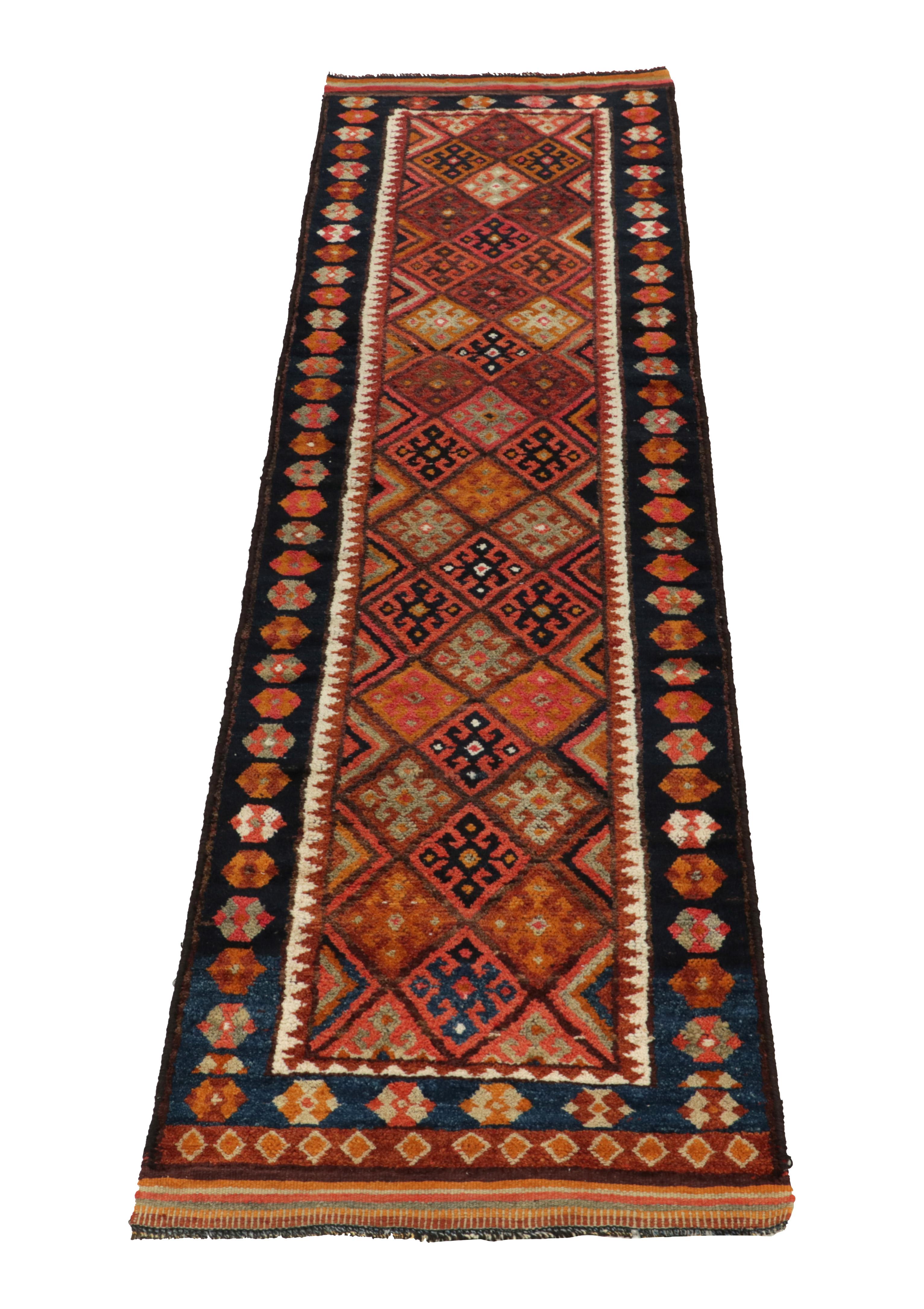 Hand-knotted in wool, a 3x11 runner from Rug & Kilim’s latest prominent curation of rare, rich tribal pieces. 

Originating from Turkey circa 1950-1960, the rug enjoys a diamond pattern on the field encasing traditional motifs in rich tones of