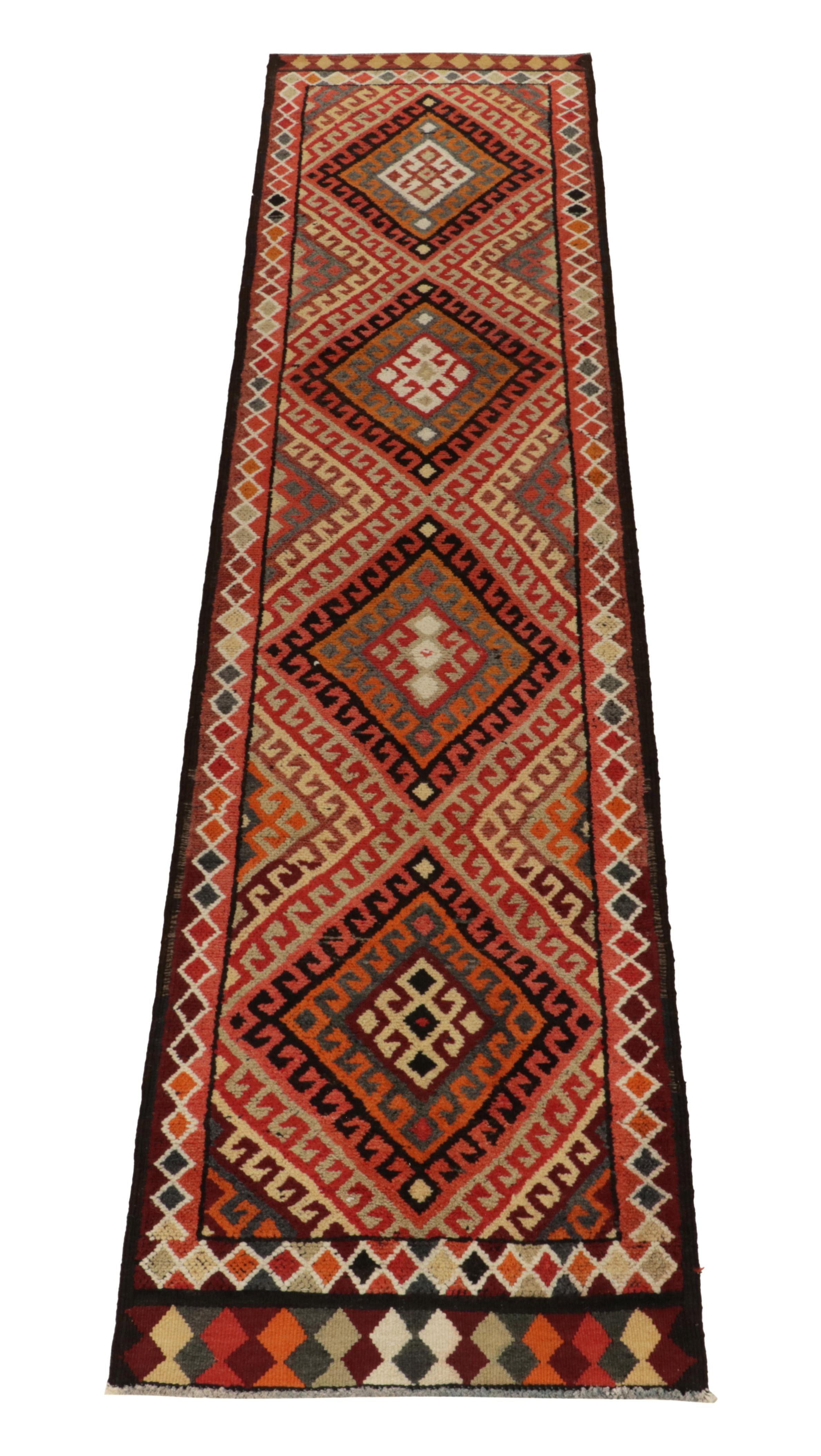 Hand-knotted in wool, a 3x12 runner from Rug & Kilim’s latest curation of rare tribal pieces from the mid-20th century. 

Originating from Turkey circa 1950-1960, the rug relishes a symmetric diamond pattern with traditional latch hooks in rich