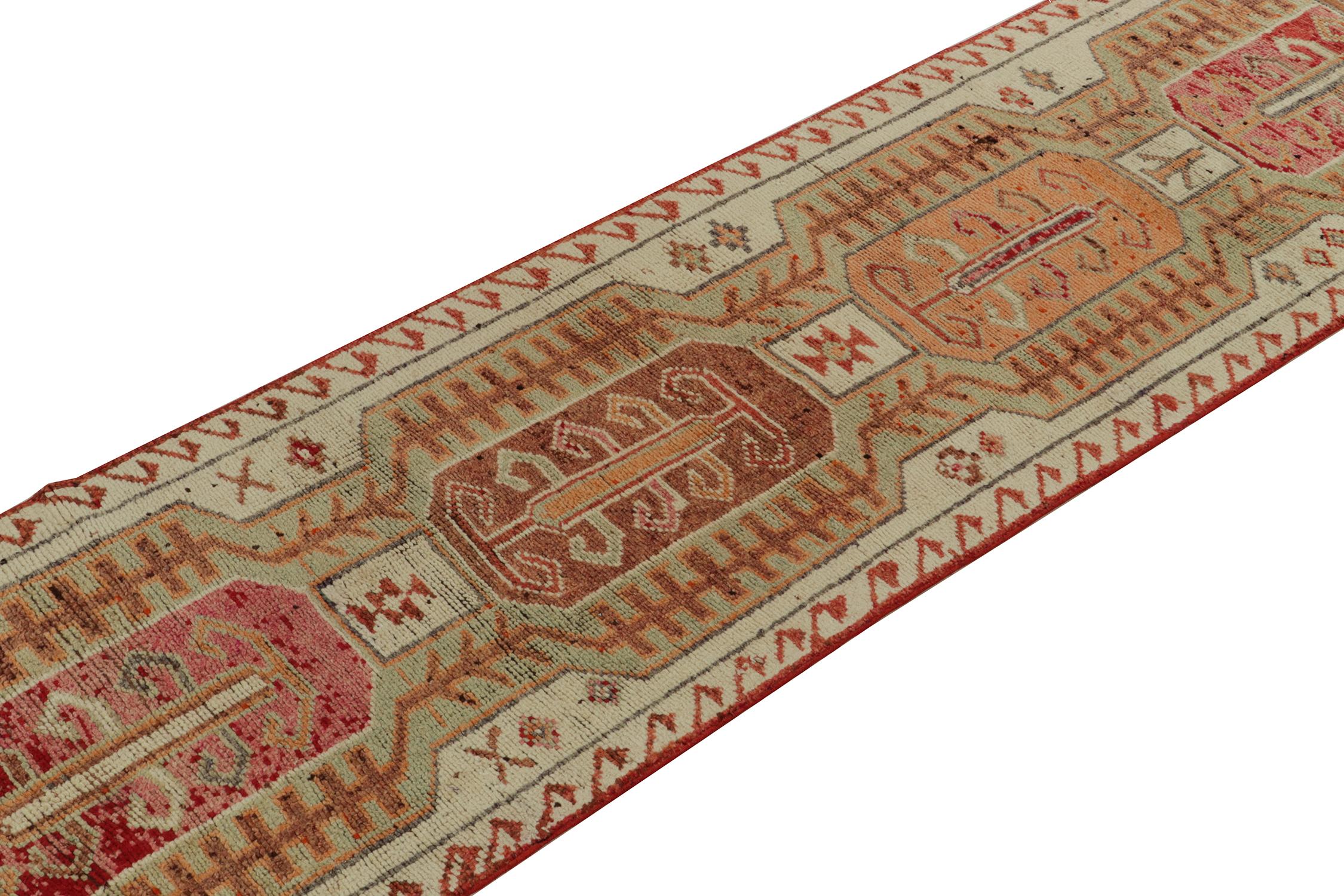 Hand-Knotted 1950s Vintage Tribal Runner in Green Red, Beige Geometric Pattern by Rug & Kilim For Sale
