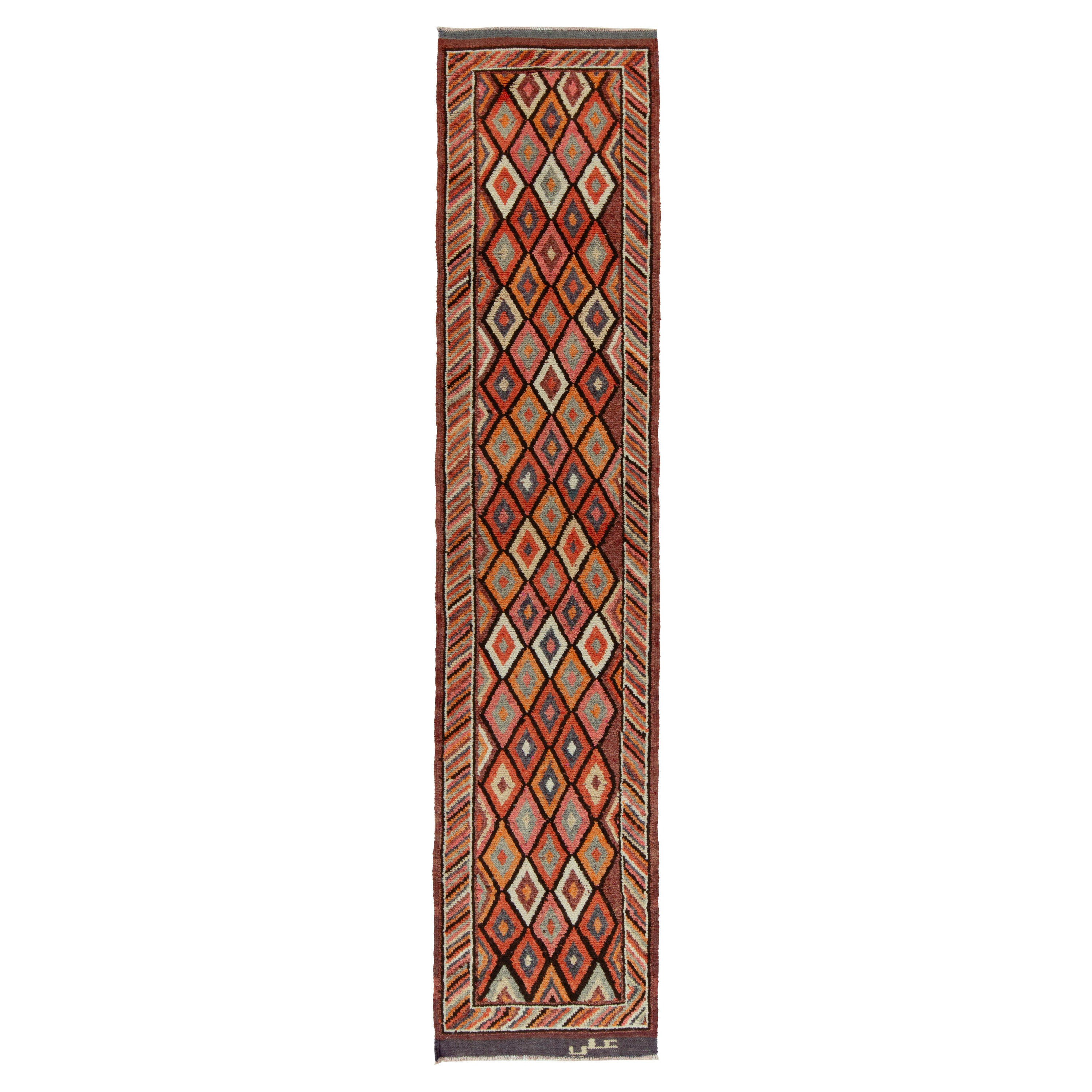 1950er Jahre Vintage Stammeskunst-Läufer in mehrfarbigen Mustern, geometrisch von Rug & Kilim