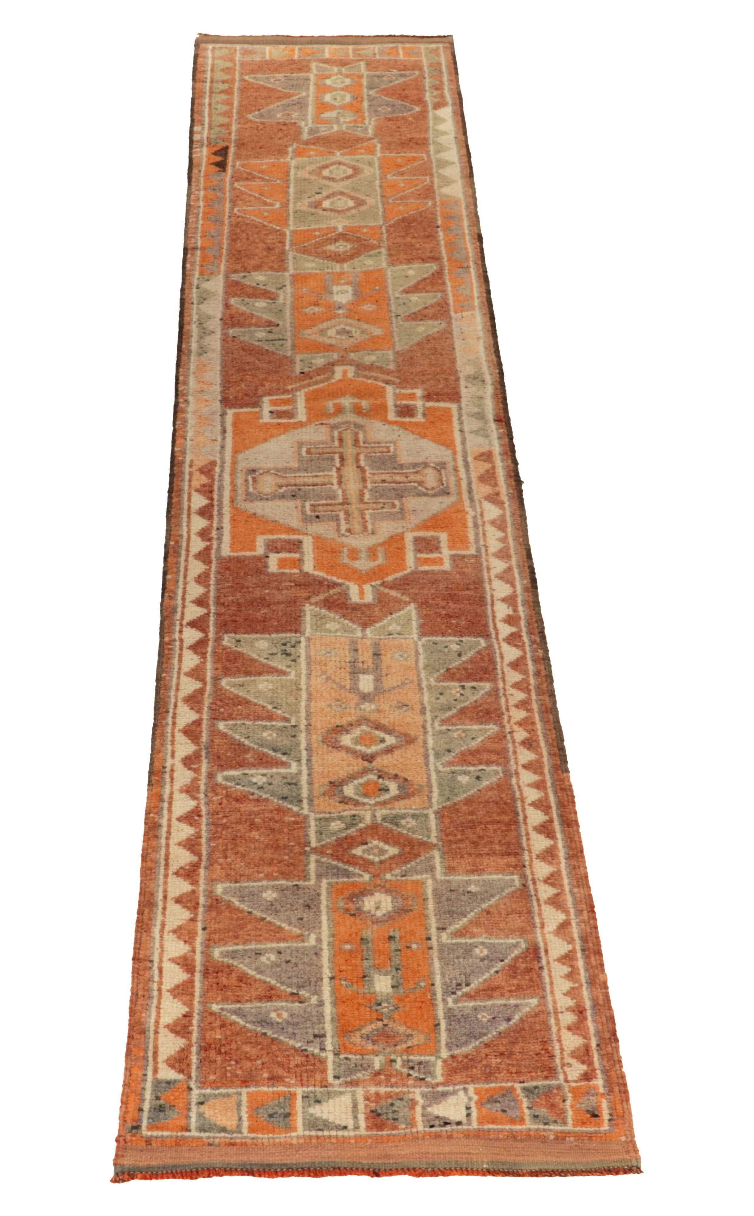 Hand-knotted in a fabulously texture wool, a 3x14 runner from Rug & Kilim’s prominent curation of rare tribal pieces. 

Originating from Turkey circa 1950-1960, the sketch enjoys traditional motifs on the field in warm orange, beige-brown, green &